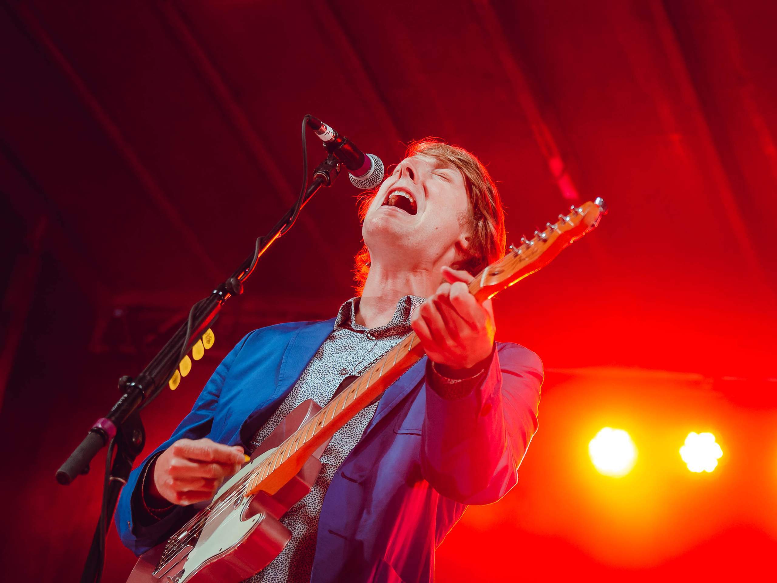 Eric Hutchinson performing Live on King Street outside The Majestic in Madison, WI July 26th, 2013, photography by Ross Harried for Second Crop Music