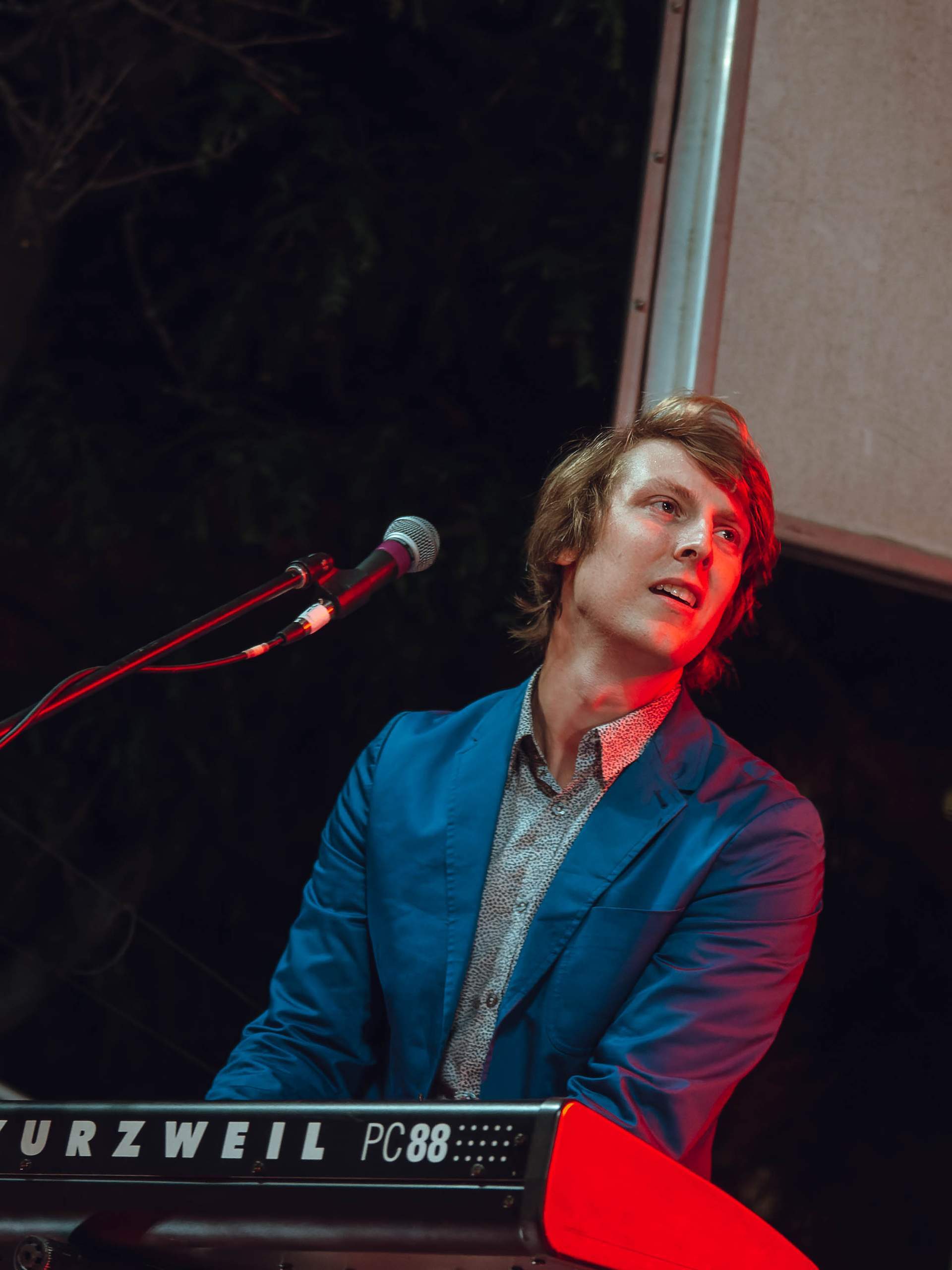 Eric Hutchinson performing Live on King Street outside The Majestic in Madison, WI July 26th, 2013, photography by Ross Harried for Second Crop Music