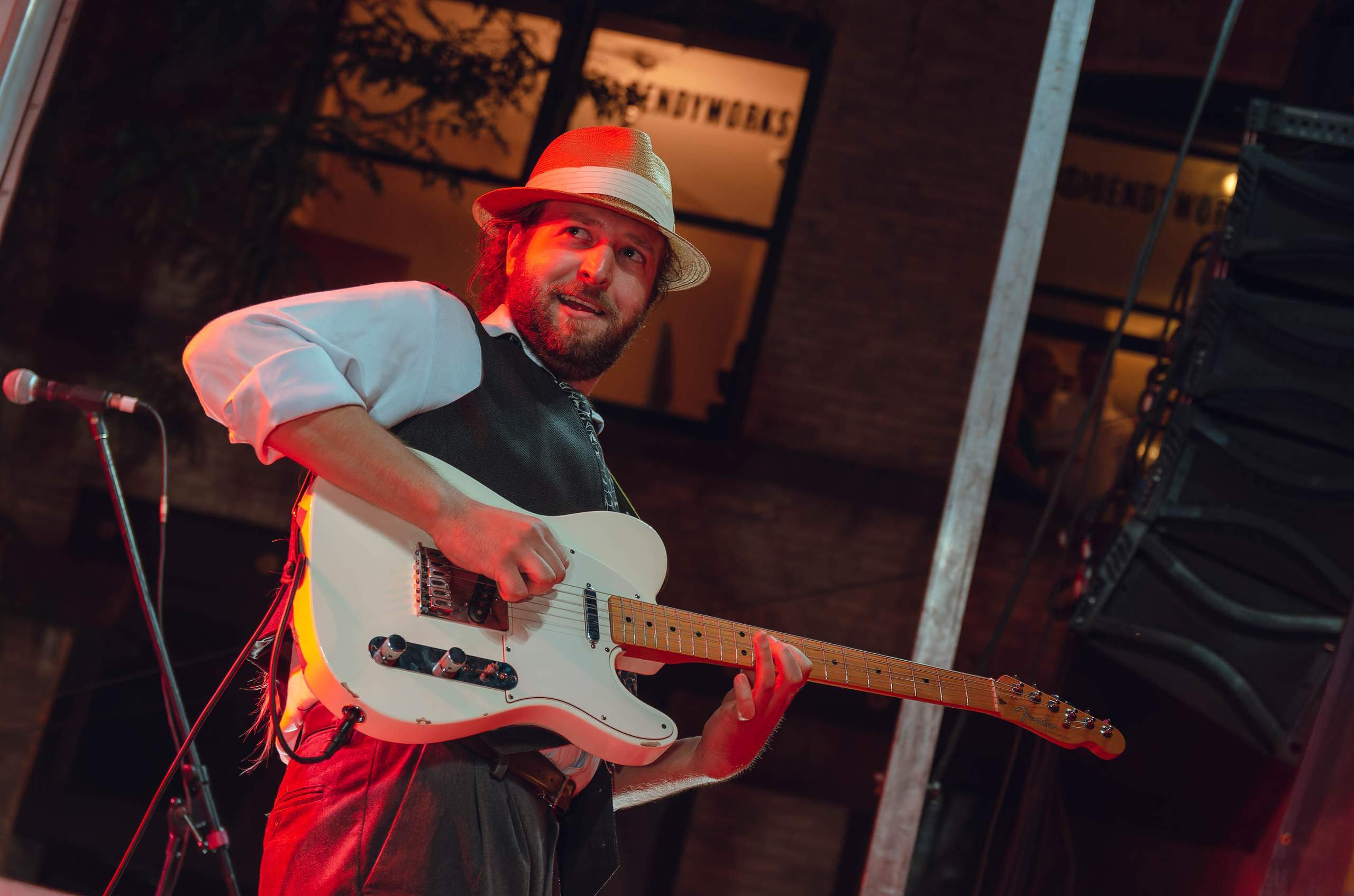 Eric Hutchinson performing Live on King Street outside The Majestic in Madison, WI July 26th, 2013, photography by Ross Harried for Second Crop Music