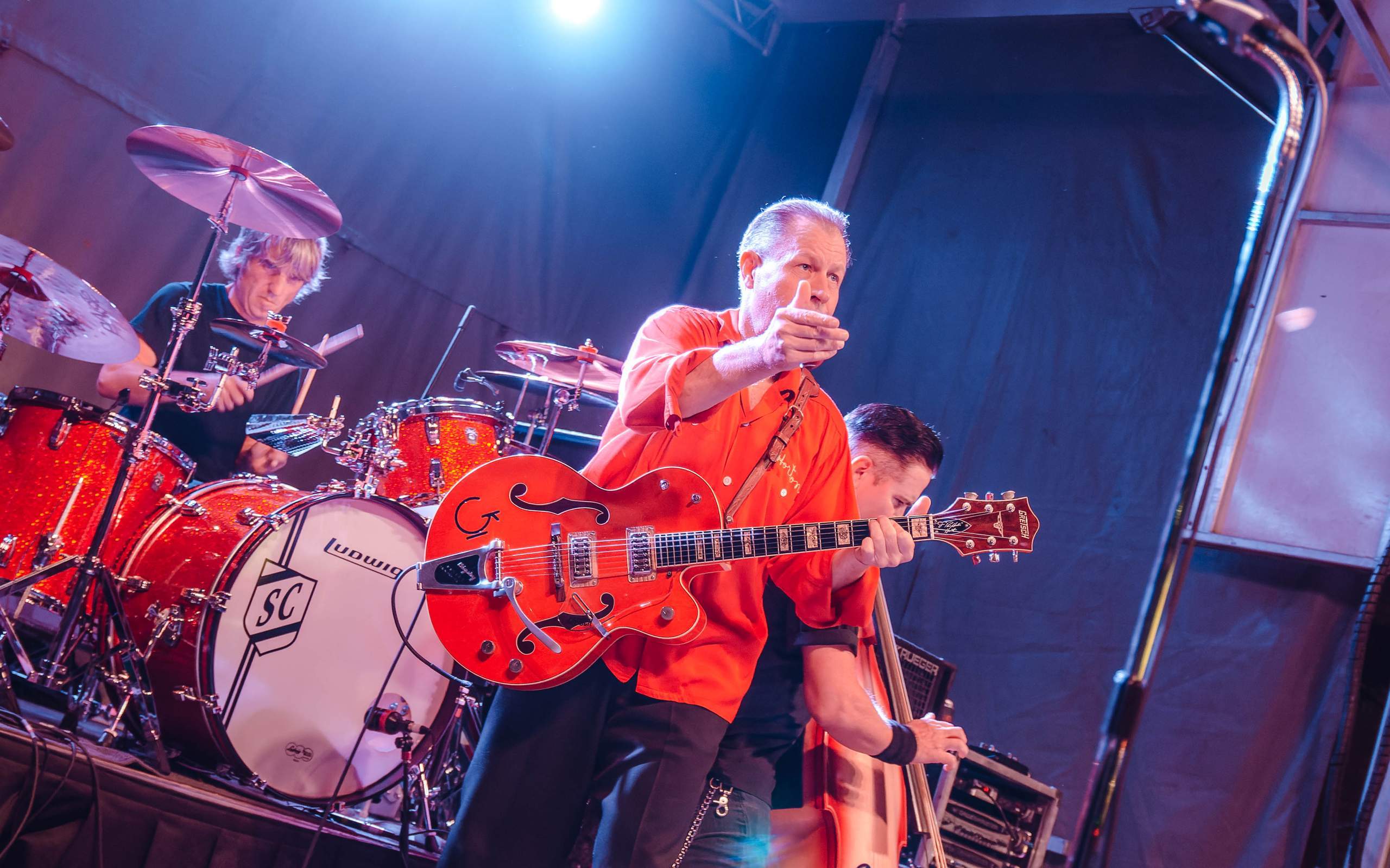 Reverend Horton Heat performing Live on King Street in Madison, WI August 23rd, 2013, photography by Ross Harried for Second Crop Music