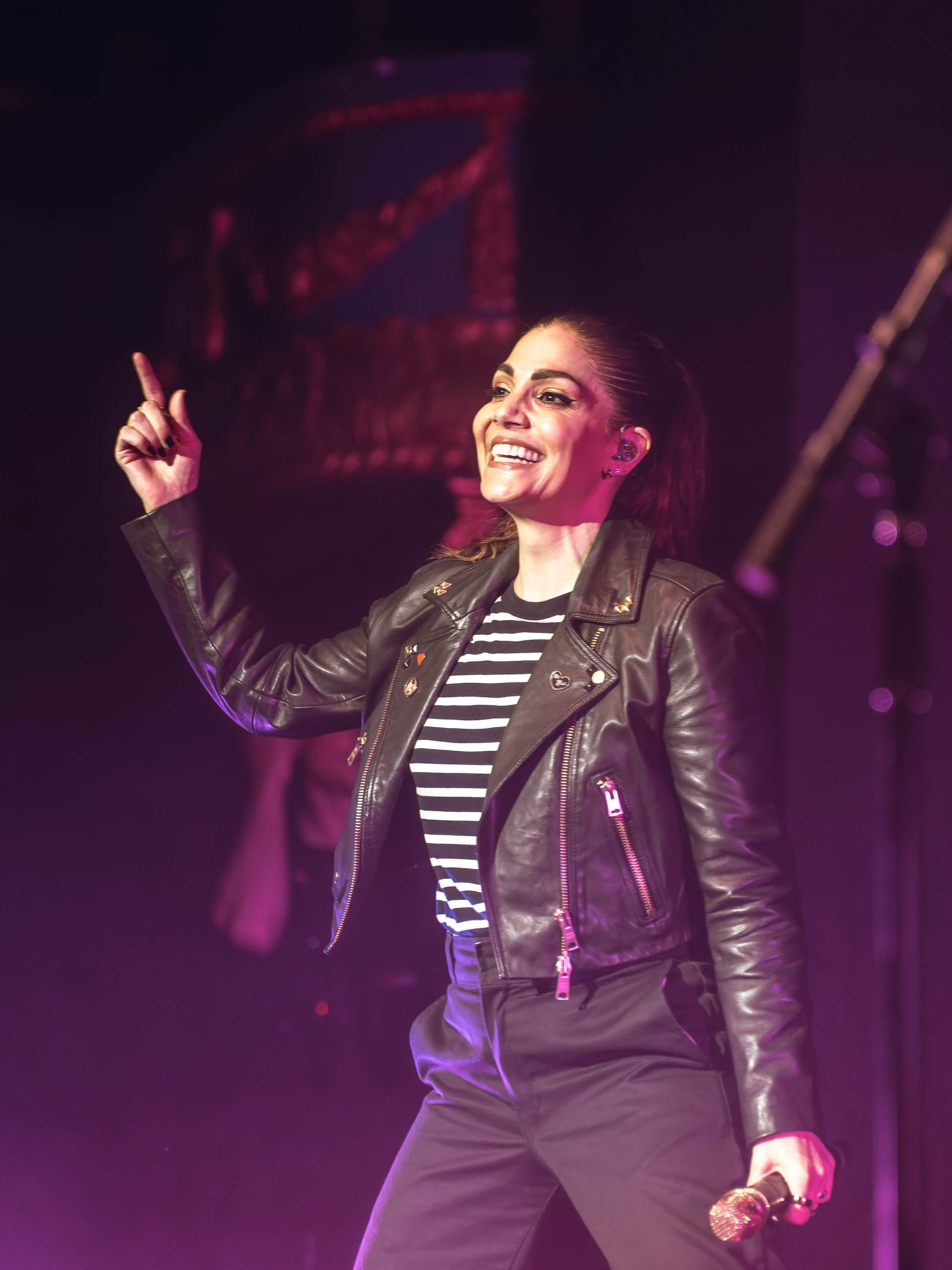 The Interrupters performing at The Rave/Eagles Club in Milwaukee, WI, April 27th, 2024, photography by Ross Harried for Second Crop Music