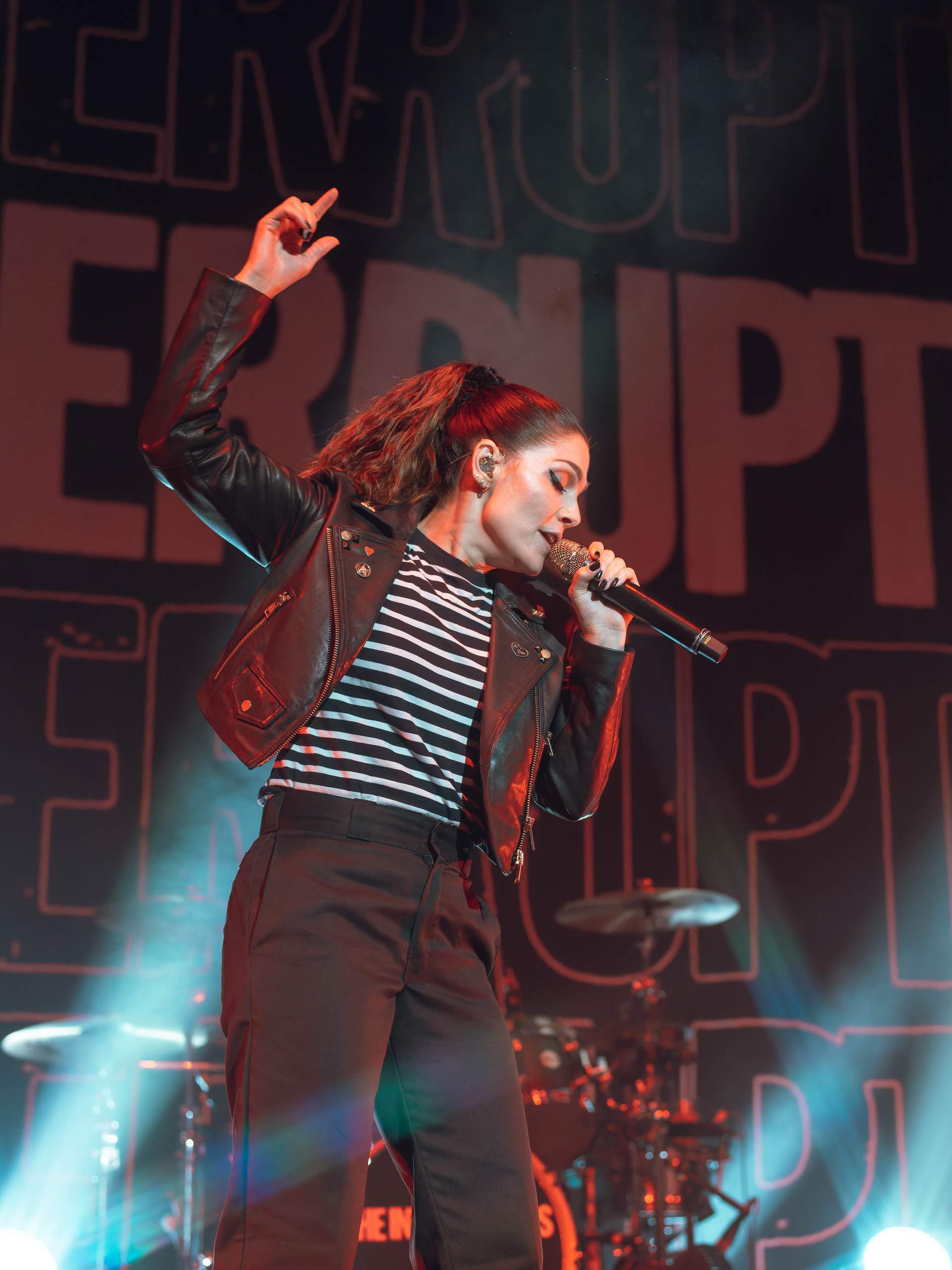 The Interrupters performing at The Rave/Eagles Club in Milwaukee, WI, April 27th, 2024, photography by Ross Harried for Second Crop Music