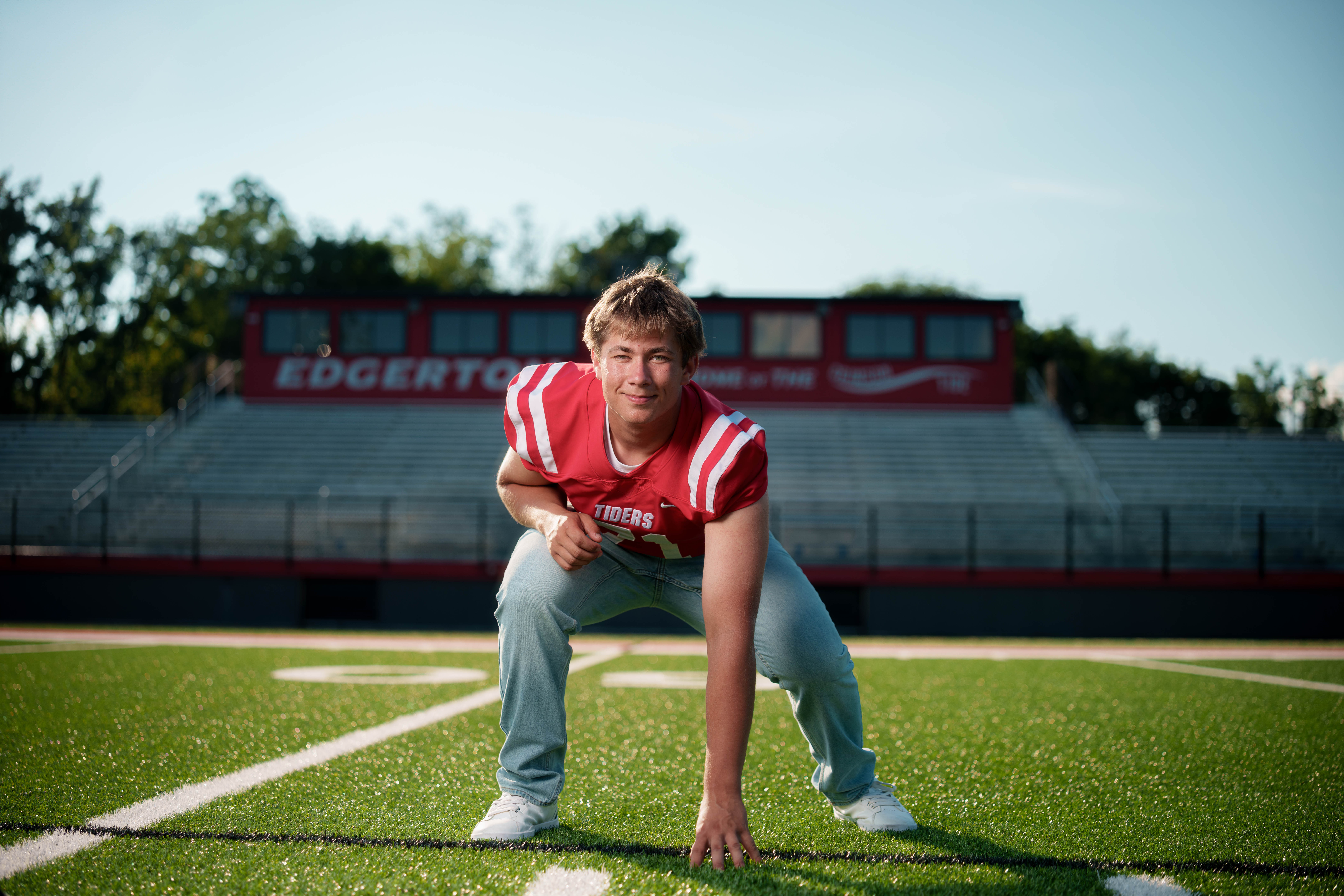 Beckett Johnson poses for senior photos at Edgerton High School in Edgerton, Wisconsin on July 15th, 2025. Johnson will graduate in 2026. Photography by Ross Harried for Second Crop Creative.