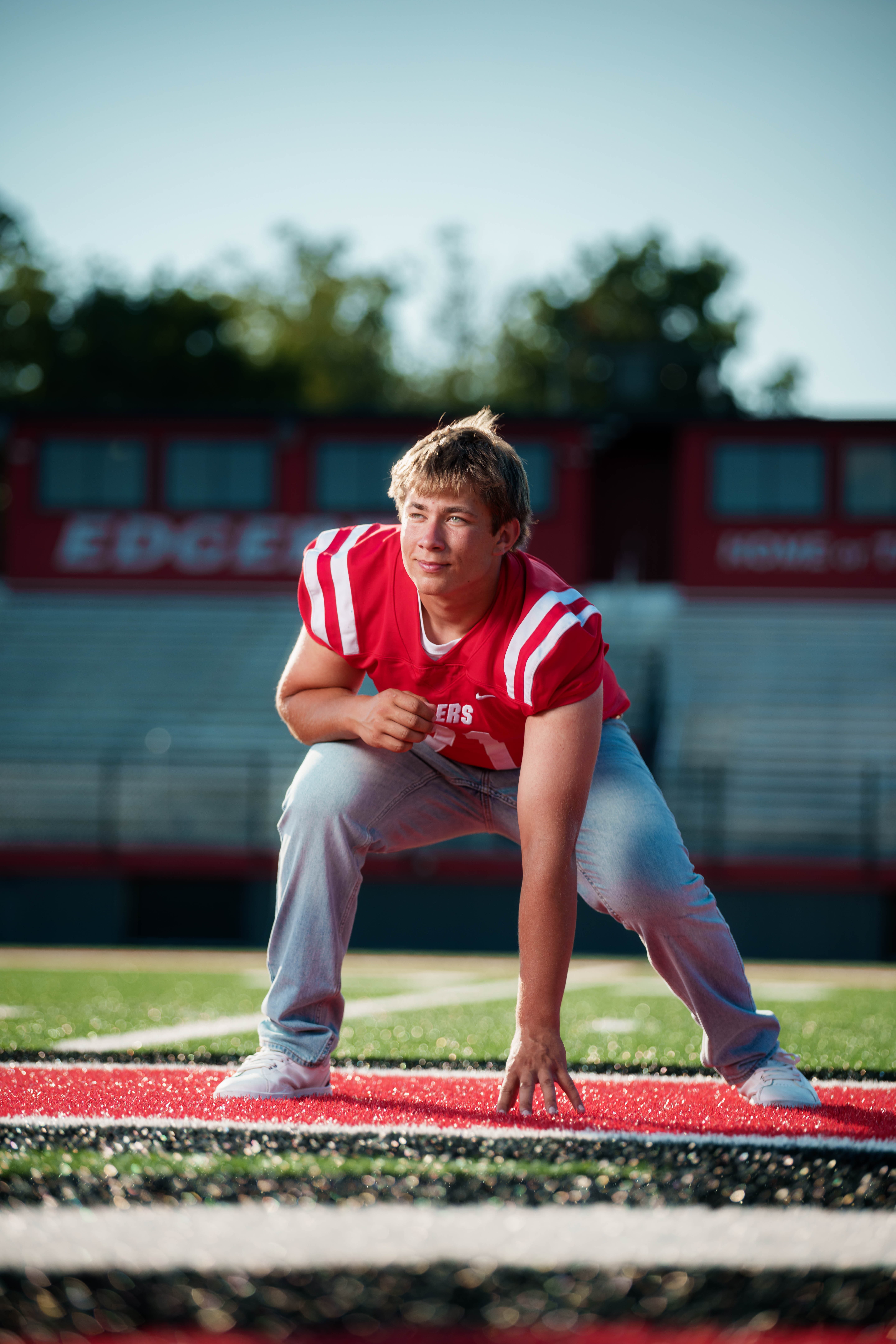 Beckett Johnson poses for senior photos at Edgerton High School in Edgerton, Wisconsin on July 15th, 2025. Johnson will graduate in 2026. Photography by Ross Harried for Second Crop Creative.