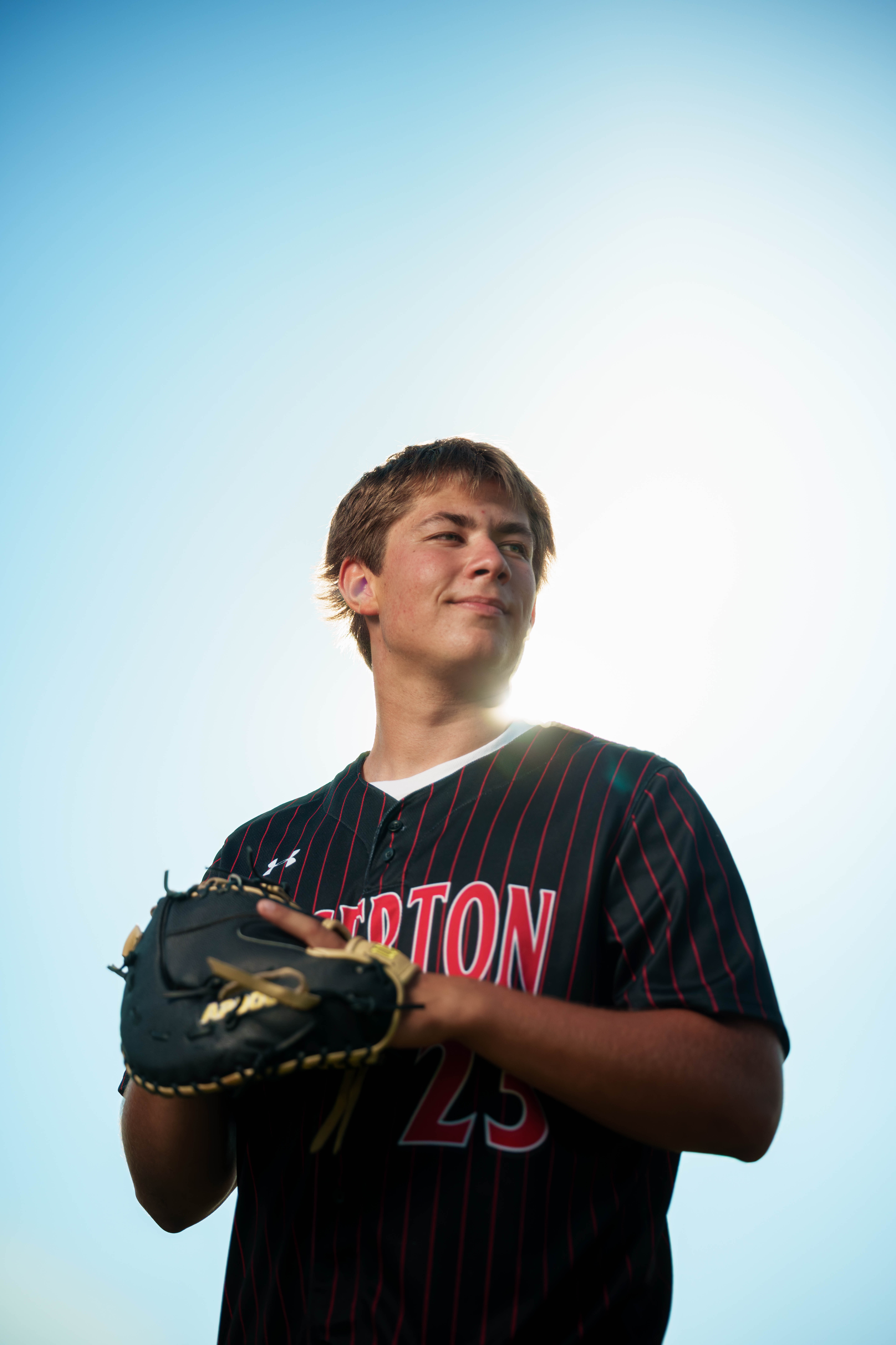 Beckett Johnson poses for senior photos at Edgerton High School in Edgerton, Wisconsin on July 15th, 2025. Johnson will graduate in 2026. Photography by Ross Harried for Second Crop Creative.