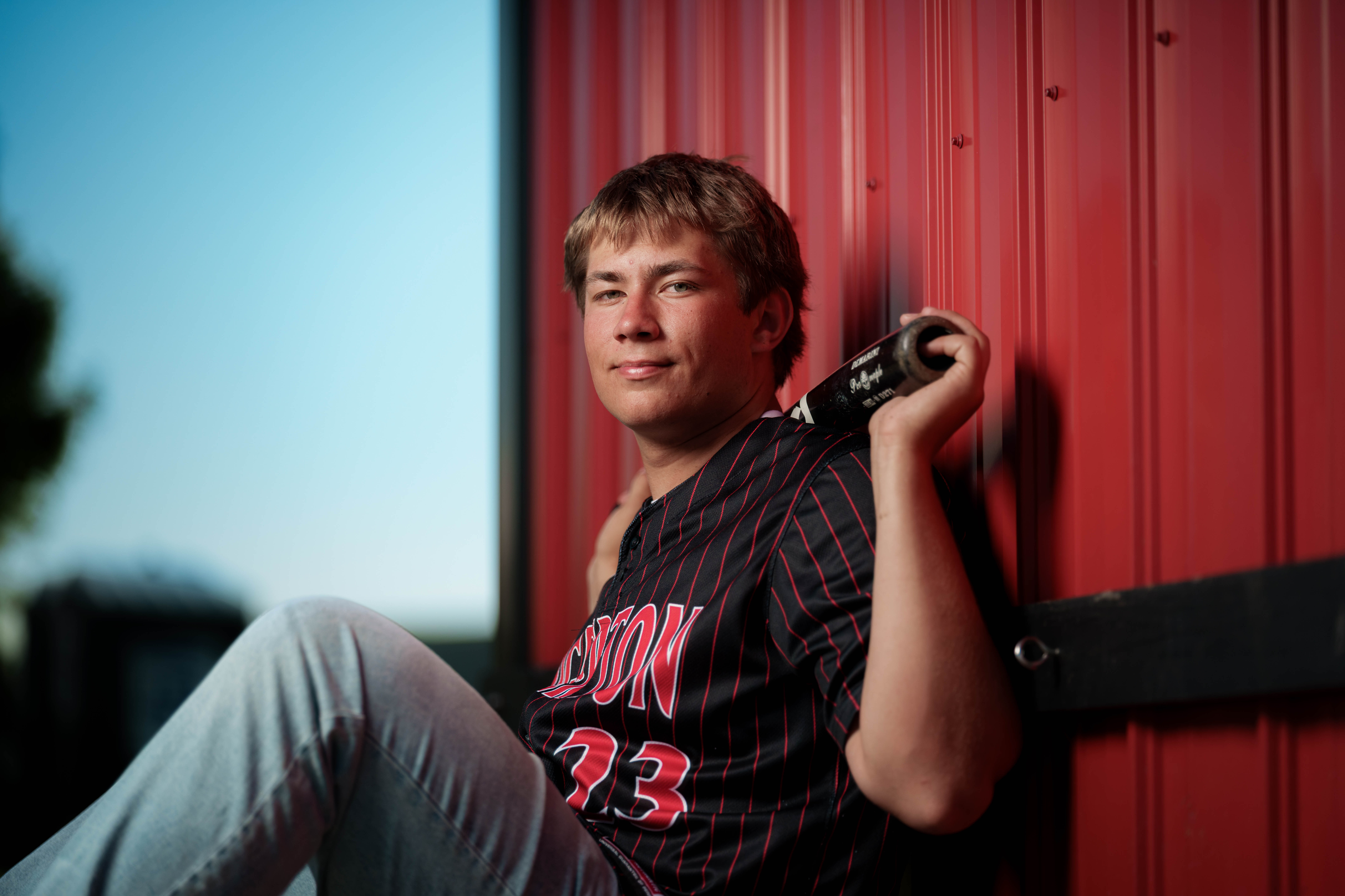 Beckett Johnson poses for senior photos at Edgerton High School in Edgerton, Wisconsin on July 15th, 2025. Johnson will graduate in 2026. Photography by Ross Harried for Second Crop Creative.