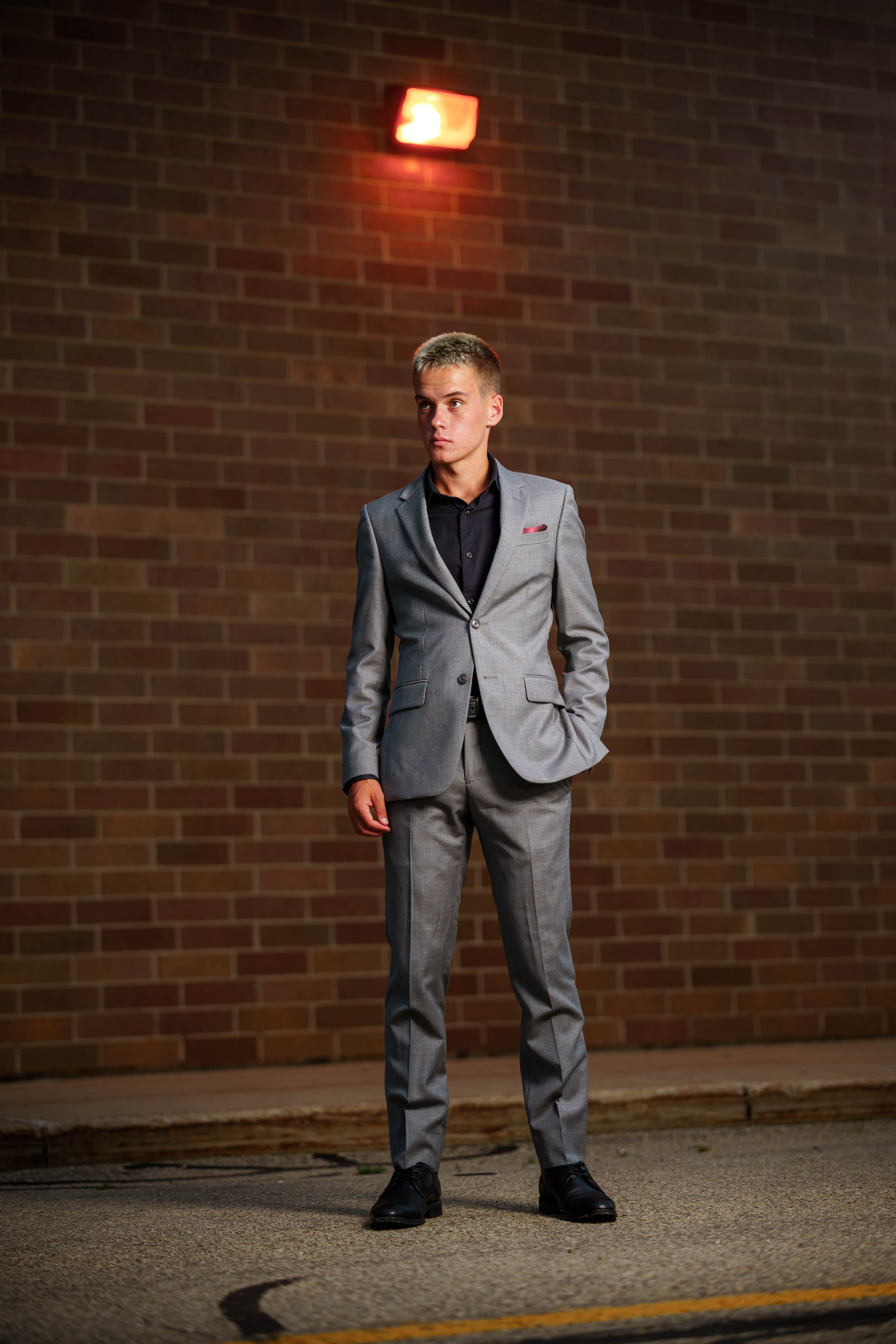 Click to View Larger Tre Dammen poses for senior photos in Monroe Wisconsin on August 11th, 2025. Dammen will graduate in 2026. Photography by Ross Harried for Second Crop Creative.