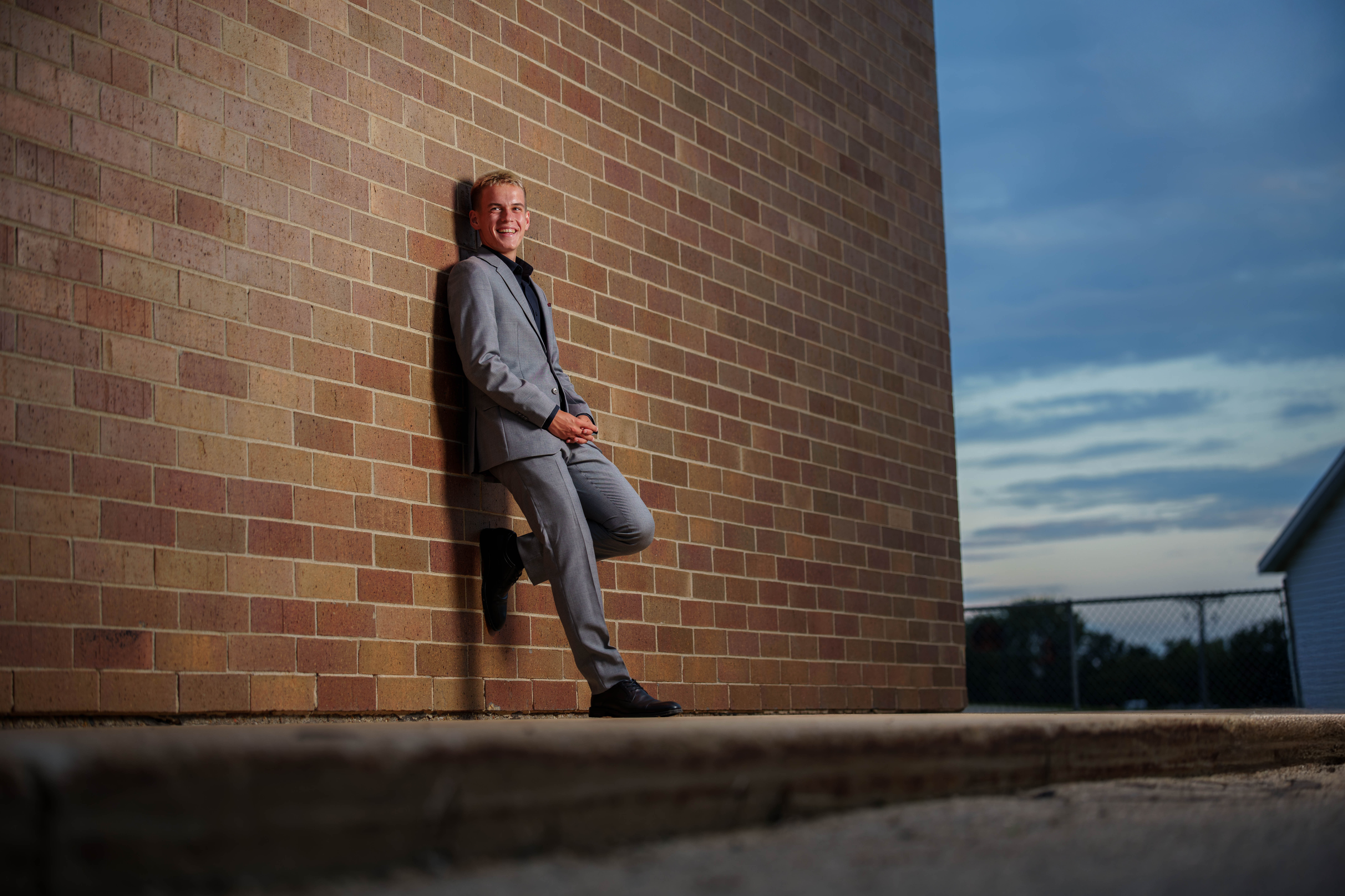 Click to View Larger Tre Dammen poses for senior photos in Monroe Wisconsin on August 11th, 2025. Dammen will graduate in 2026. Photography by Ross Harried for Second Crop Creative.