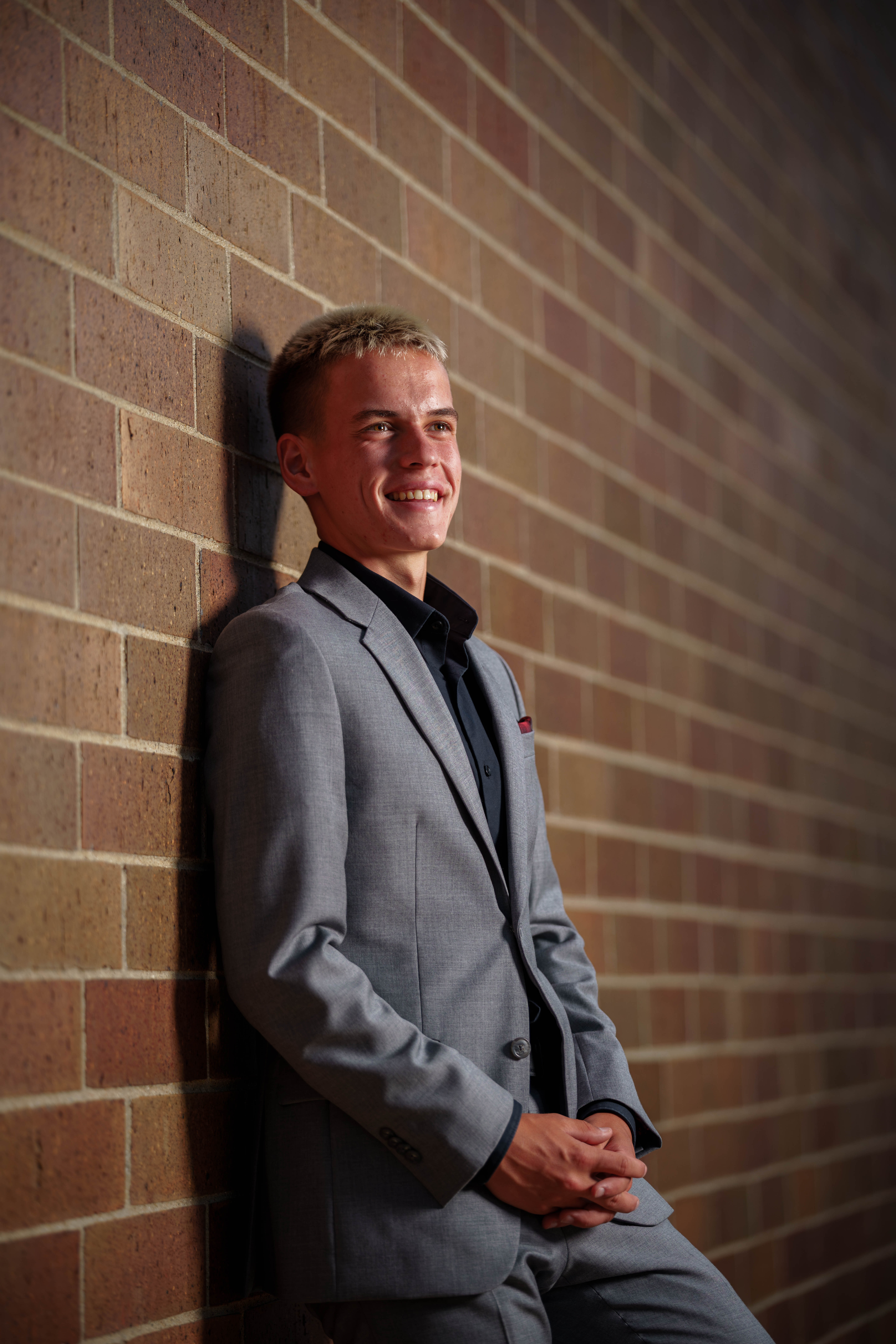 Click to View Larger Tre Dammen poses for senior photos in Monroe Wisconsin on August 11th, 2025. Dammen will graduate in 2026. Photography by Ross Harried for Second Crop Creative.