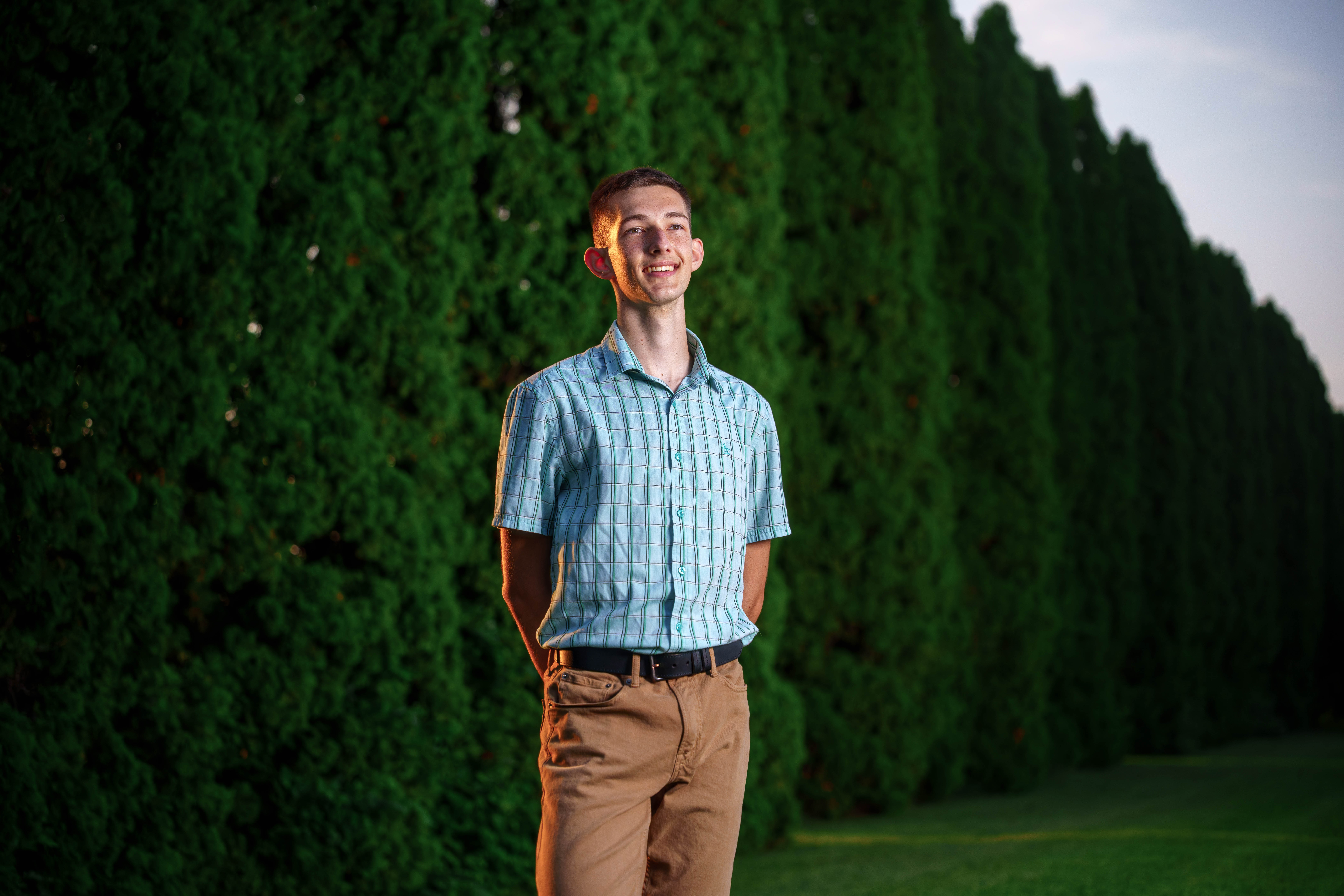 Click to View Larger James Mayer poses for senior photos in Monroe Wisconsin on August 12th, 2025. Mayer will graduate in 2026. Photography by Ross Harried for Second Crop Creative.