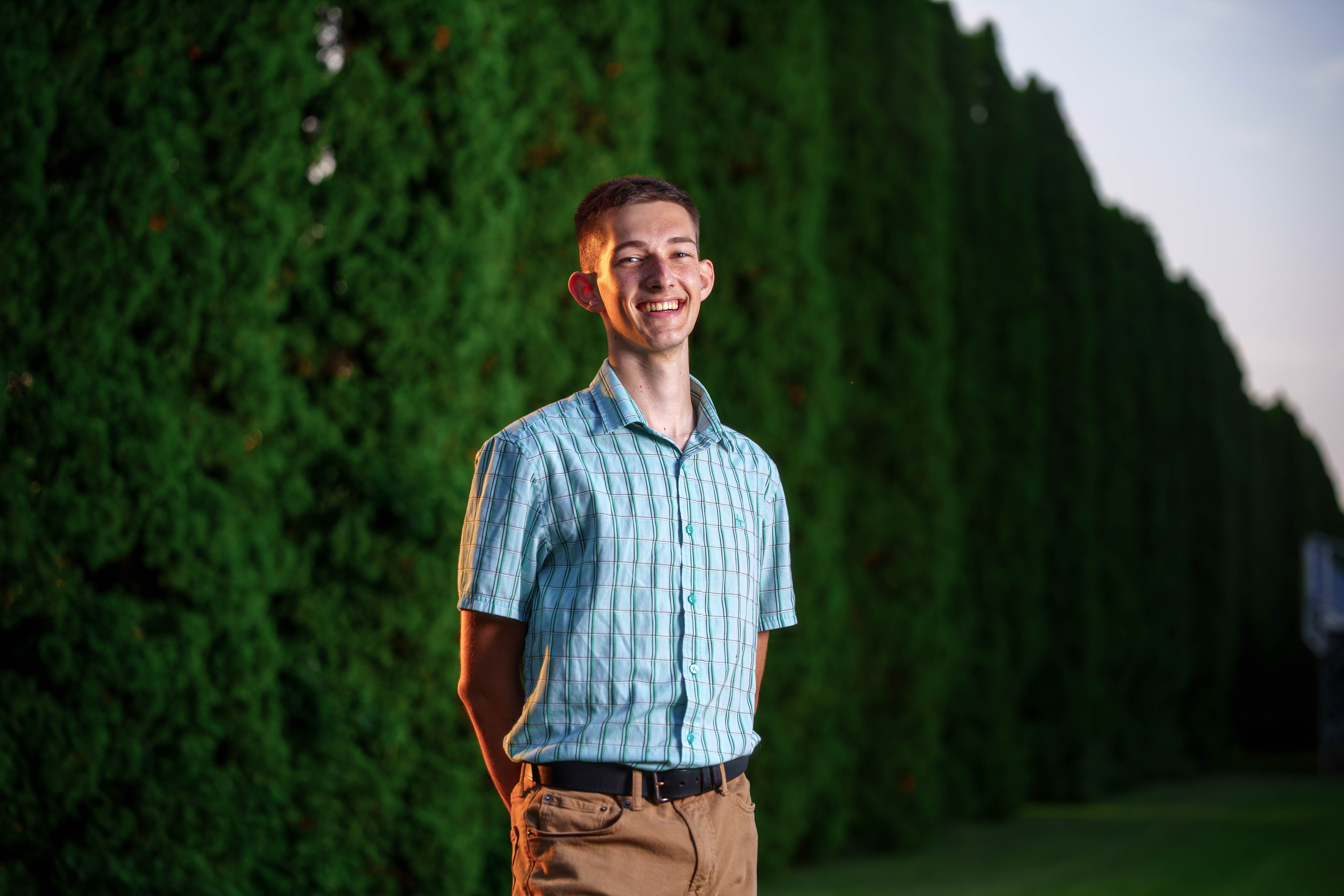 Click to View Larger James Mayer poses for senior photos in Monroe Wisconsin on August 12th, 2025. Mayer will graduate in 2026. Photography by Ross Harried for Second Crop Creative.