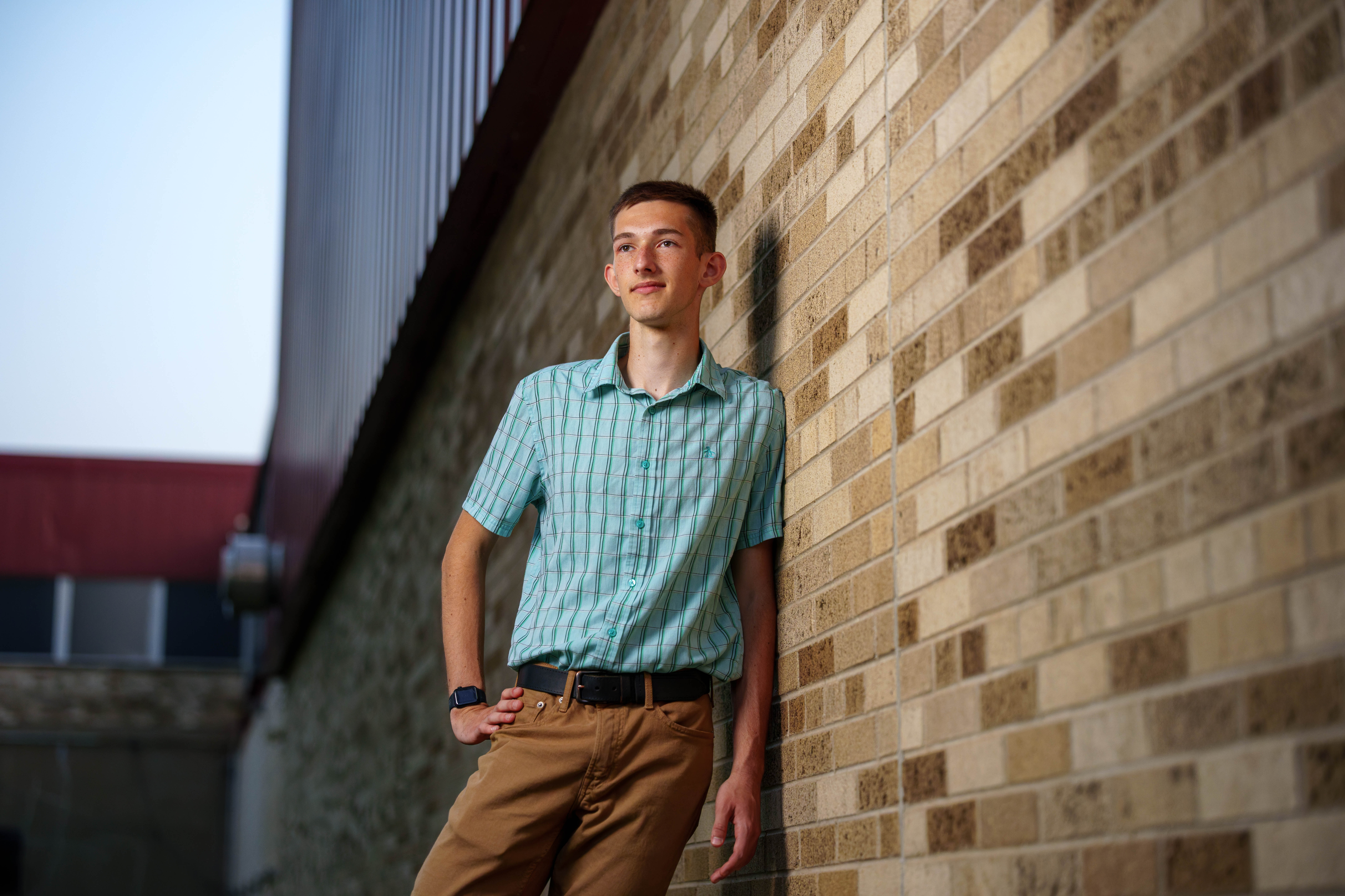 Click to View Larger James Mayer poses for senior photos in Monroe Wisconsin on August 12th, 2025. Mayer will graduate in 2026. Photography by Ross Harried for Second Crop Creative.
