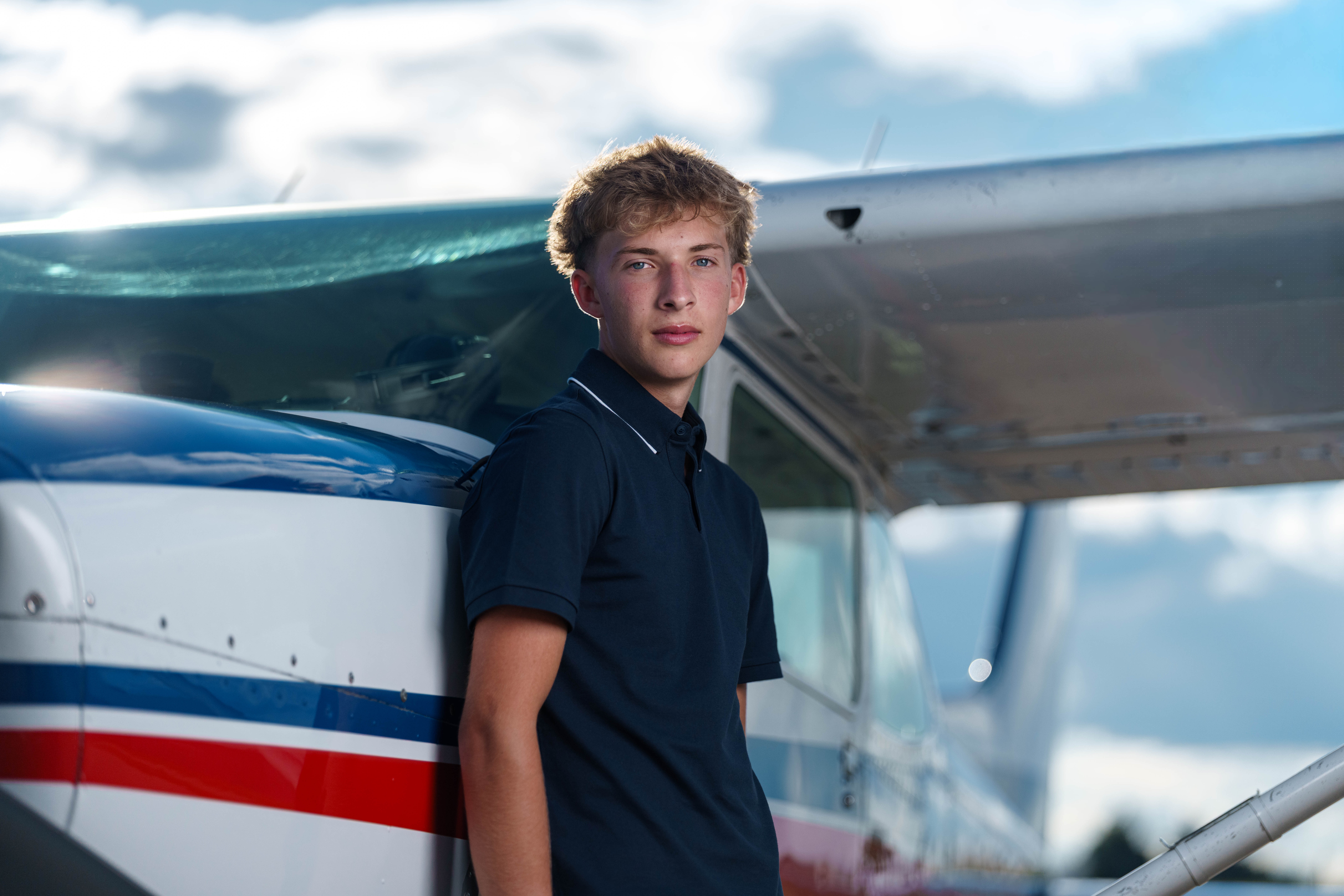 Click to View Larger Hans Brandt poses for senior photos in Monroe, Wisconsin on August 26th, 2025. Brandt will graduate in 2026. Photography by Ross Harried for Second Crop Creative.