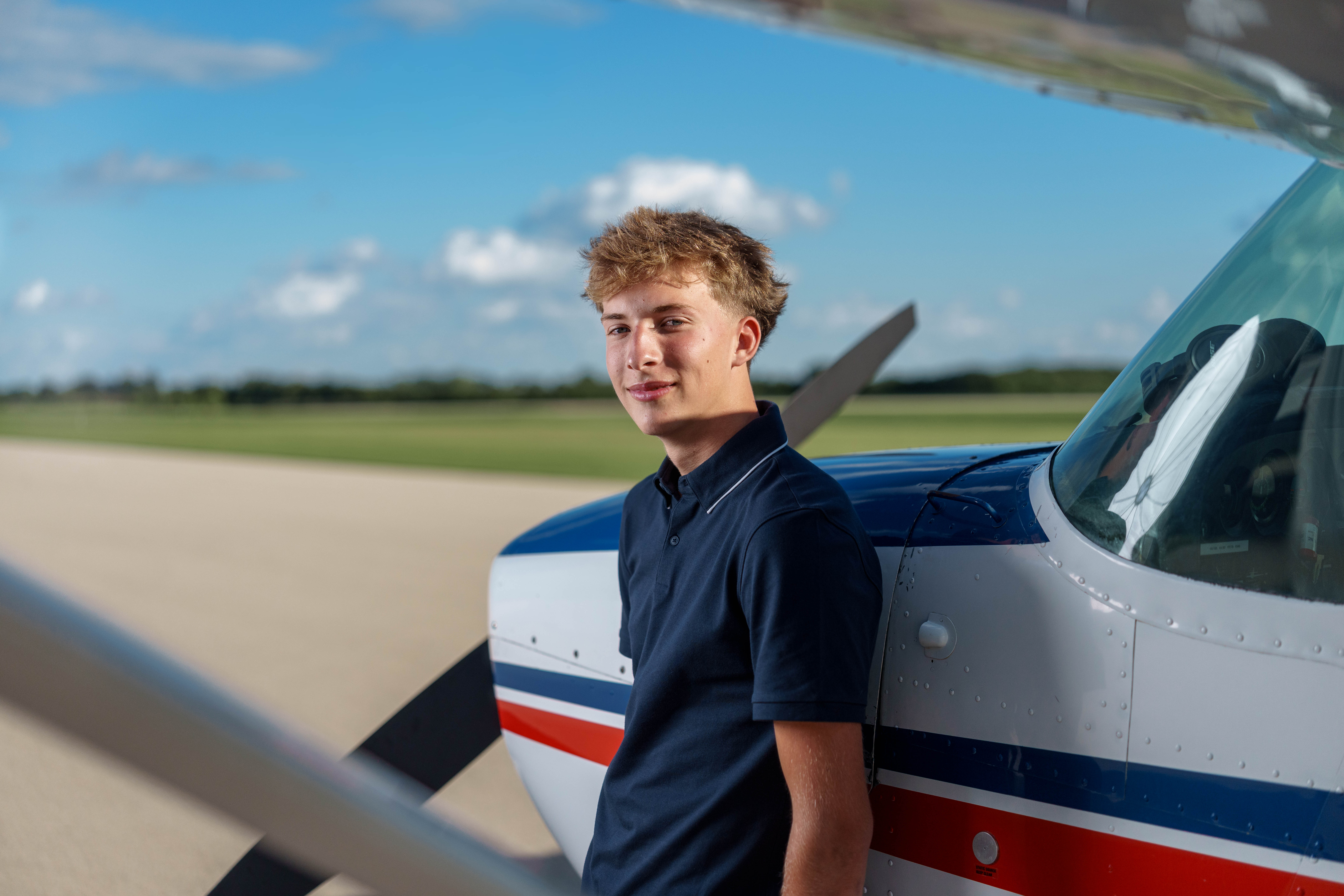Click to View Larger Hans Brandt poses for senior photos in Monroe, Wisconsin on August 26th, 2025. Brandt will graduate in 2026. Photography by Ross Harried for Second Crop Creative.