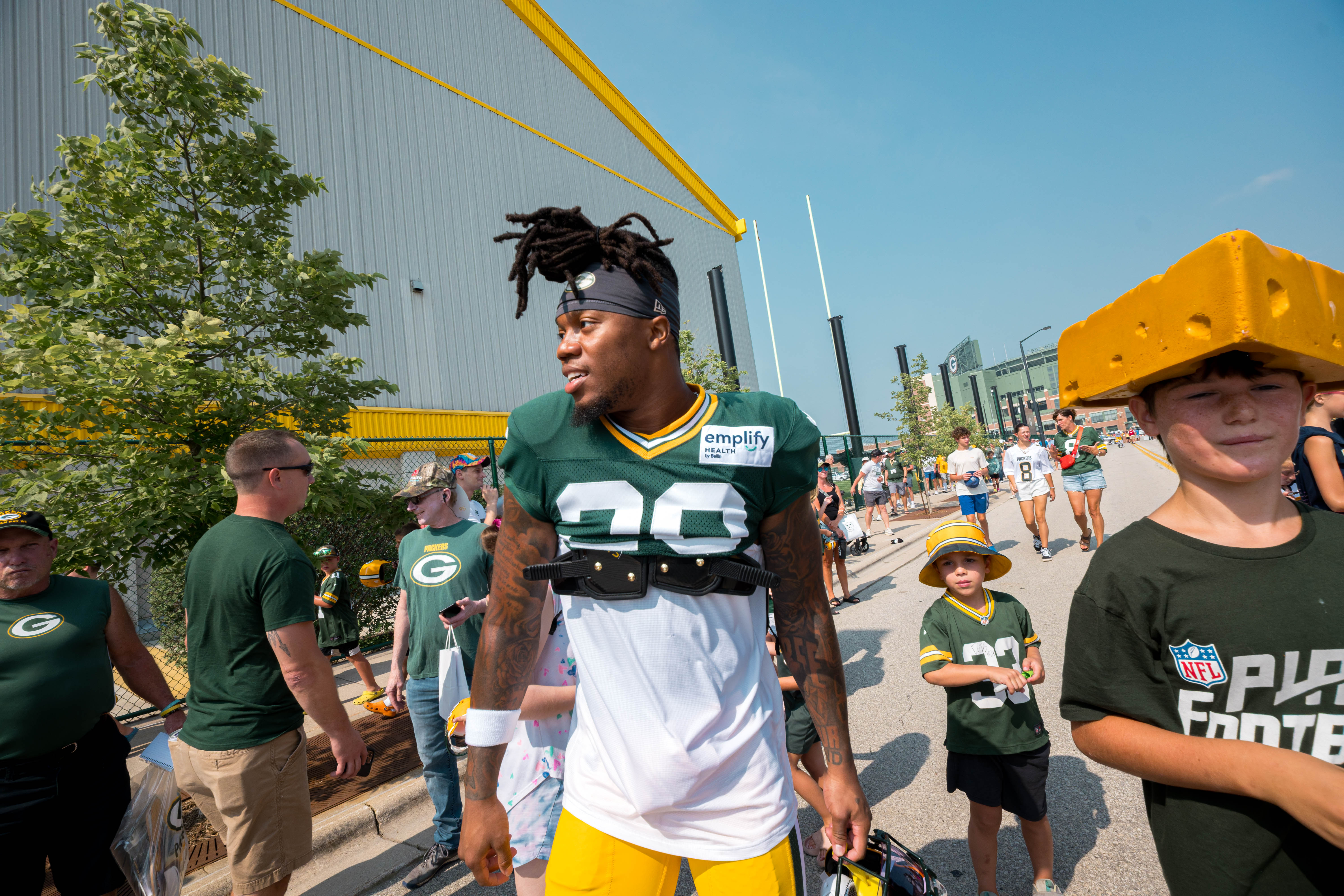 Green Bay Packers players sign autographs for young fans during training camp in Green Bay, Wisconsin, on August 6th, 2025. Photography by Ross Harried for Second Crop Sports.