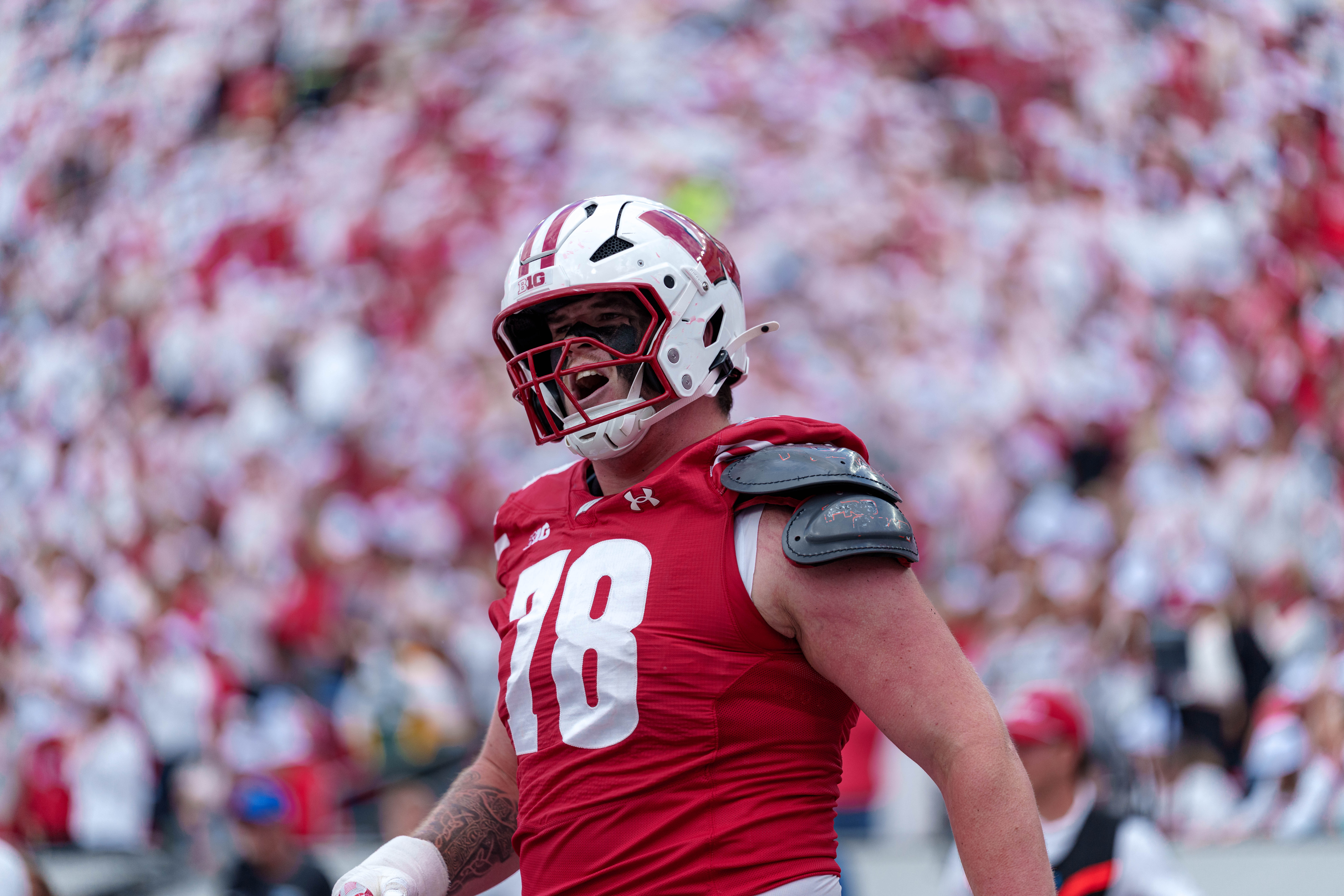 Sept 6, 2025; Madison, Wisconsin, USA; Wisconsin Badgers offensive lineman Colin Cubberly (78) celebrates a touchdown durning a college football game between the Wisconsin Badgers and the Middle Tennessee Blue Raiders at Camp Randall Stadium on September 06, 2025 in Madison, Wisconsin. Photography by Ross Harried for Second Crop Sports.