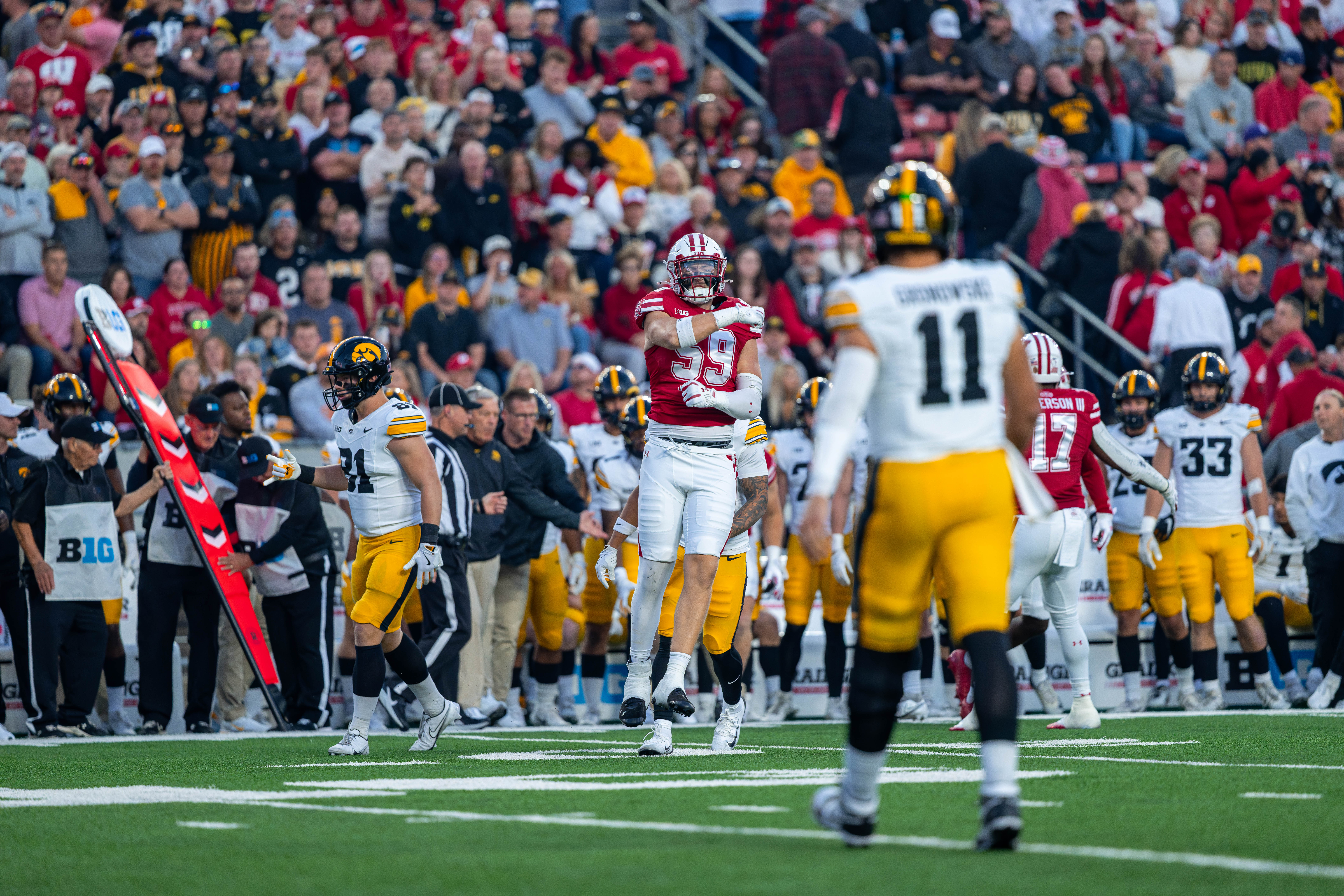 Oct 11, 2025; Madison, Wisconsin, USA; Wisconsin Badgers outside linebacker Aaron Witt (59) celebrates after a defensive stop in the first quarter against the Iowa Hawkeyes at Camp Randall Stadium. Mandatory Credit Photography by Ross Harried for Second Crop Sports.