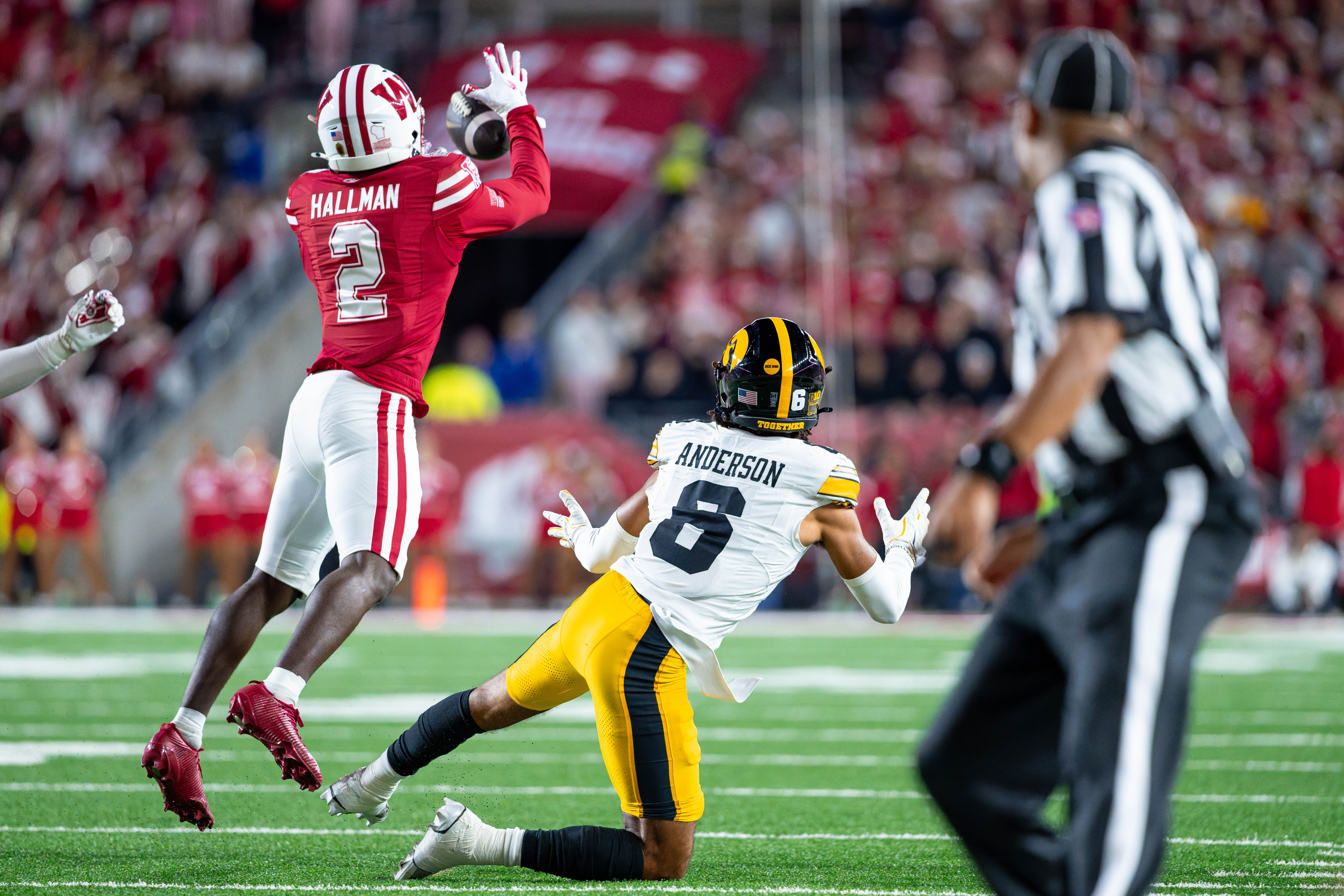 Oct 11, 2025; Madison, Wisconsin, USA; Wisconsin Badgers cornerback Ricardo Hallman (2) intercepts a pass in the first half against the Iowa Hawkeyes at Camp Randall Stadium. Mandatory Credit Photography by Ross Harried for Second Crop Sports.