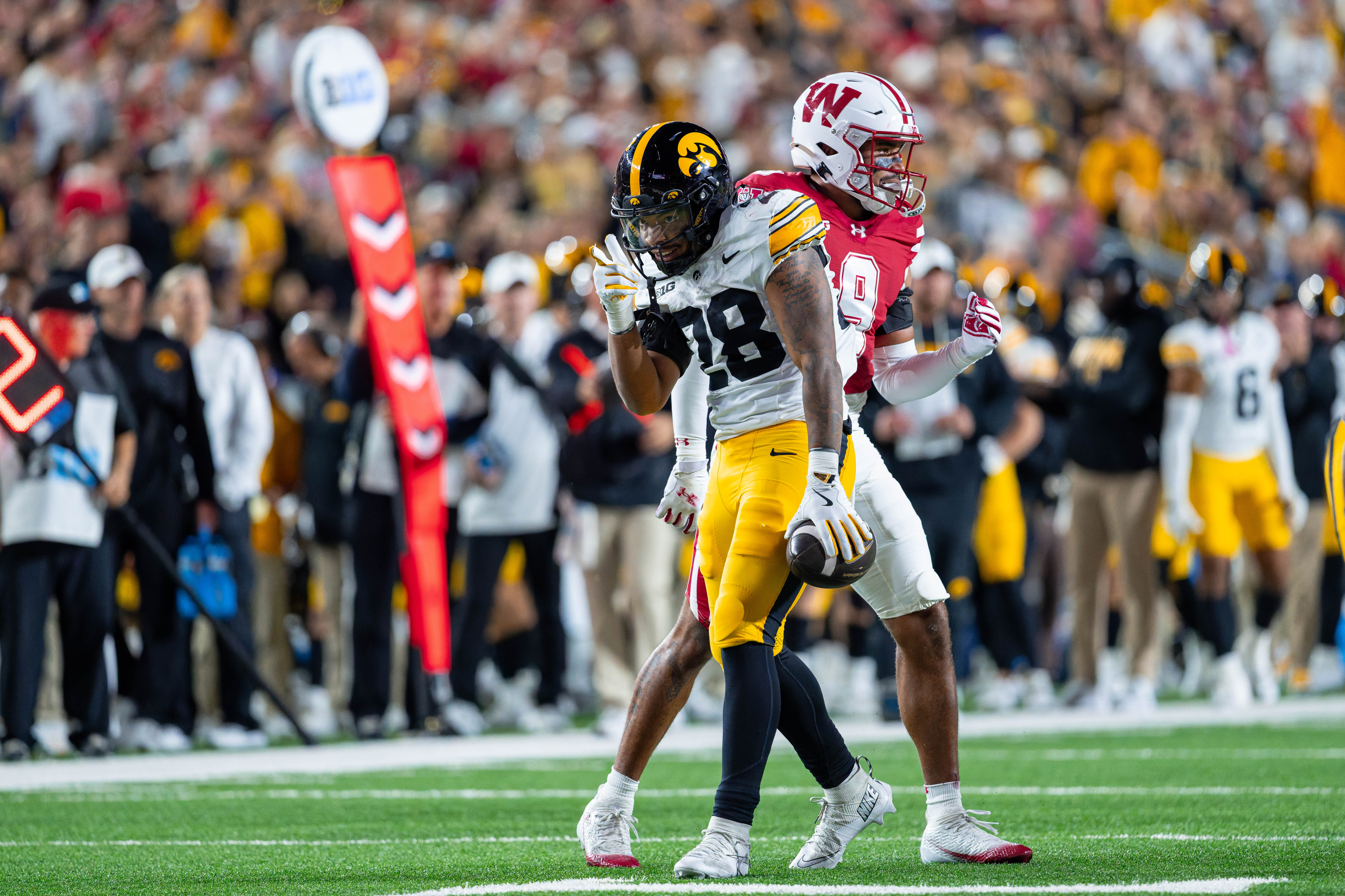 Oct 11, 2025; Madison, Wisconsin, USA; Iowa Hawkeyes running back Kamari Moulton (28) celebrates a first down in the first half against the Wisconsin Badgers at Camp Randall Stadium. Mandatory Credit Photography by Ross Harried for Second Crop Sports.
