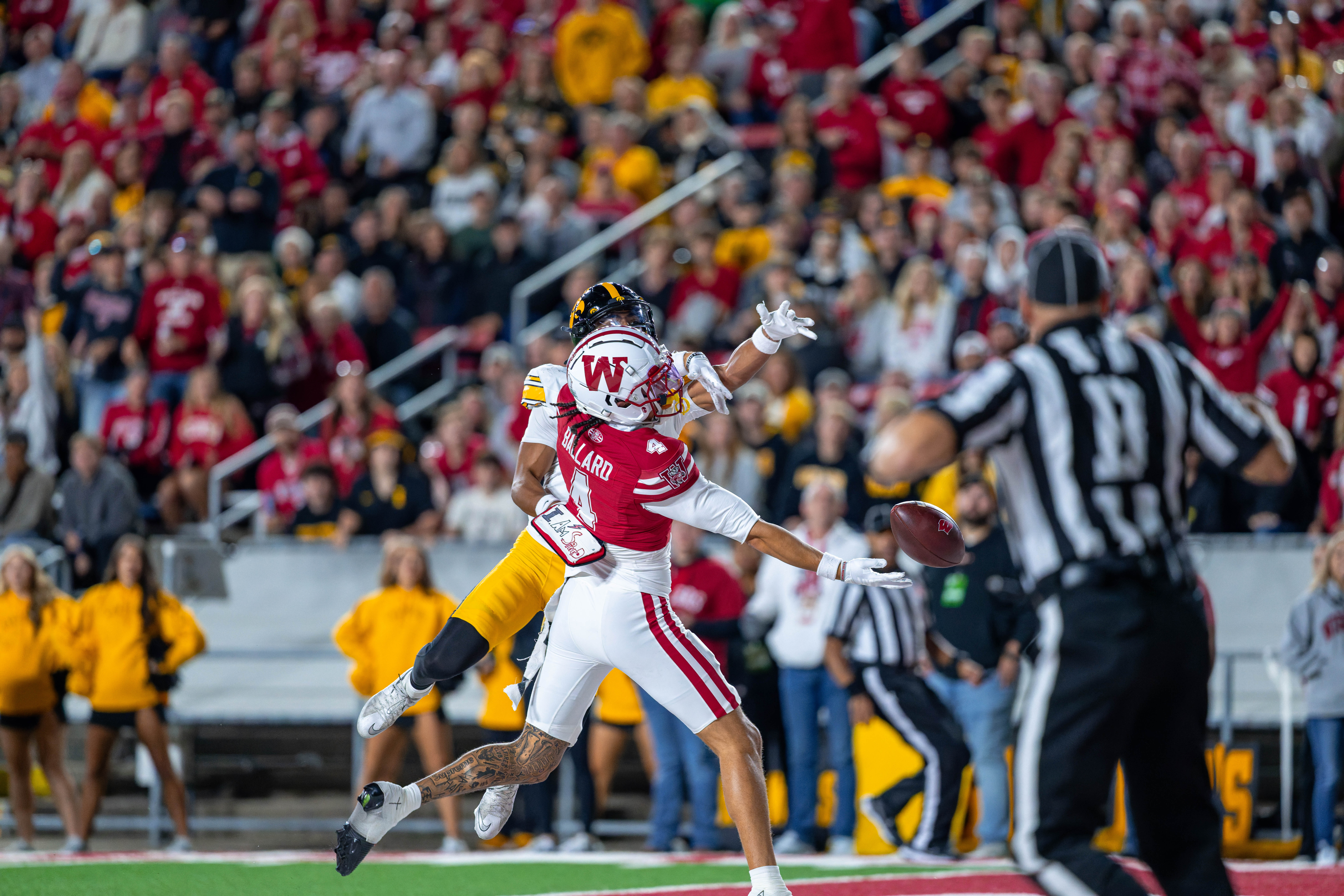 Oct 11, 2025; Madison, Wisconsin, USA; Wisconsin Badgers wide receiver Jayden Ballard (4) can’t hold onto a pass in the end zone against the Iowa Hawkeyes in the first half at Camp Randall Stadium. Mandatory Credit Photography by Ross Harried for Second Crop Sports.