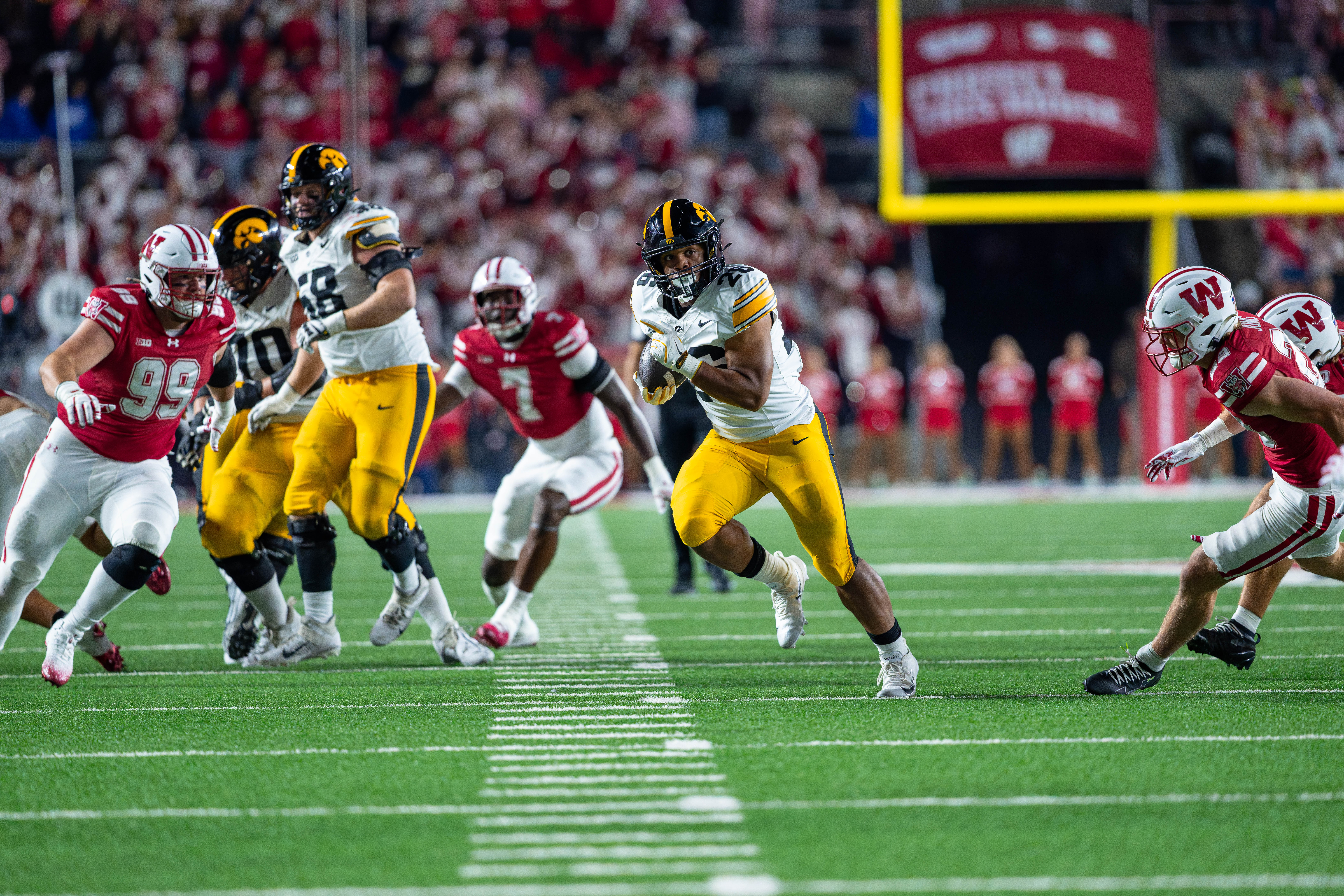 Oct 11, 2025; Madison, Wisconsin, USA; Iowa Hawkeyes running back Xavier Williams (26) runs the ball in the second half against the Wisconsin Badgers at Camp Randall Stadium. Mandatory Credit Photography by Ross Harried for Second Crop Sports.