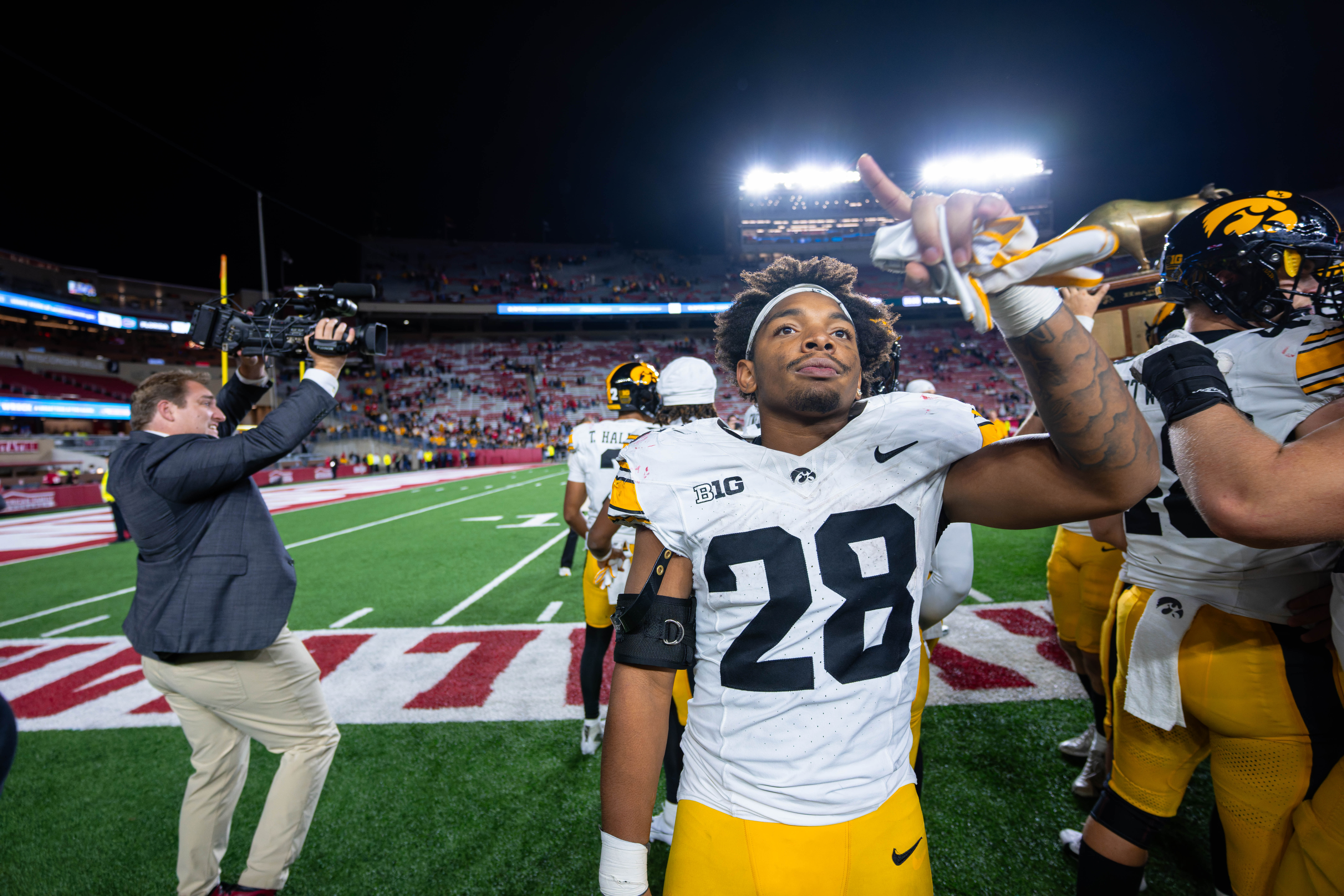 Oct 11, 2025; Madison, Wisconsin, USA; Iowa Hawkeyes running back Kamari Moulton (28) celebrates a win against the Wisconsin Badgers at Camp Randall Stadium. Mandatory Credit Photography by Ross Harried for Second Crop Sports.