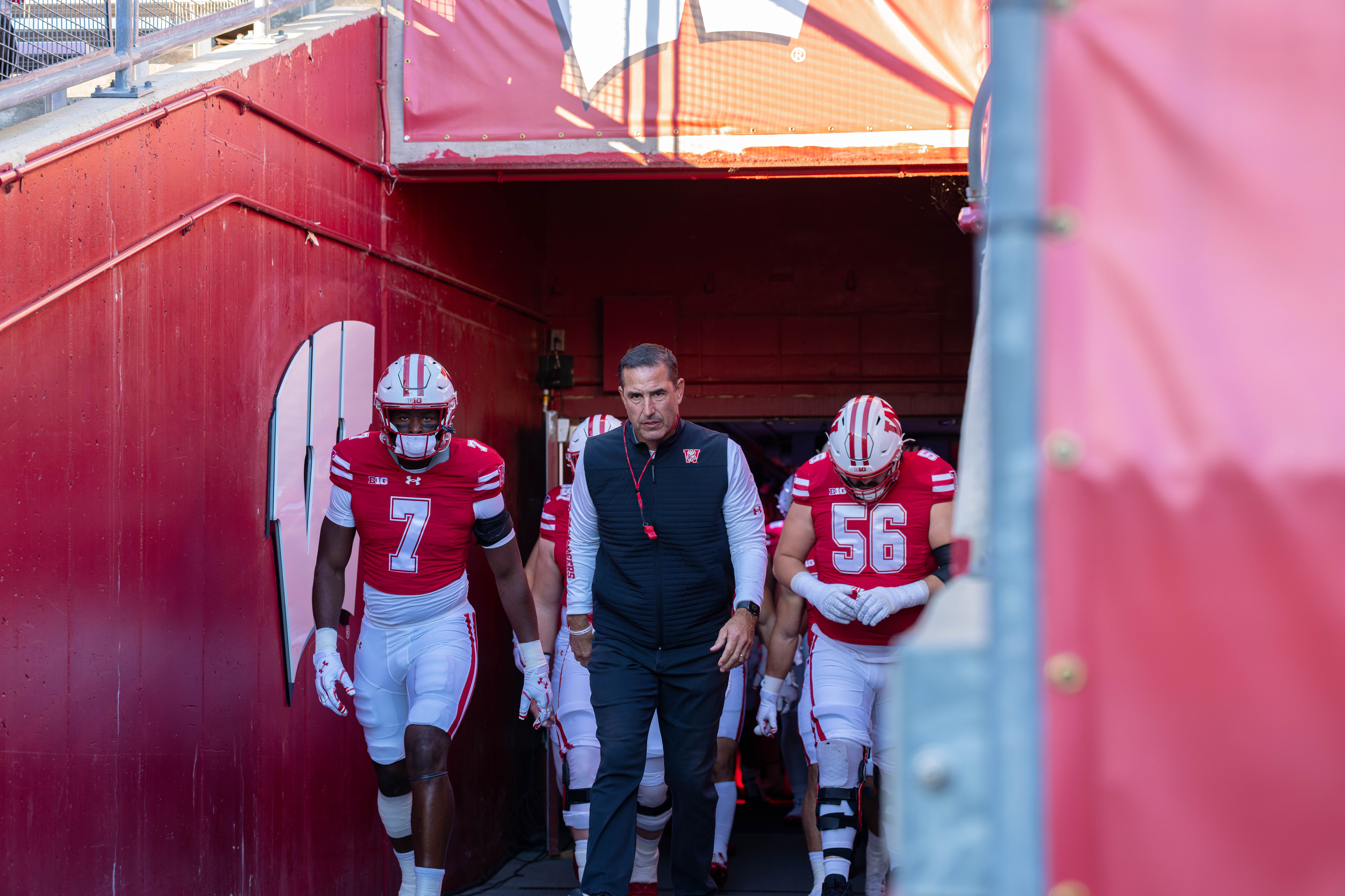 Oct 11, 2025; Madison, Wisconsin, USA; Wisconsin Badgers head coach Luke Fickell leads the Badgers out of the locker room before a game against the Iowa Hawkeyes at Camp Randall Stadium. Mandatory Credit Photography by Ross Harried for Second Crop Sports.