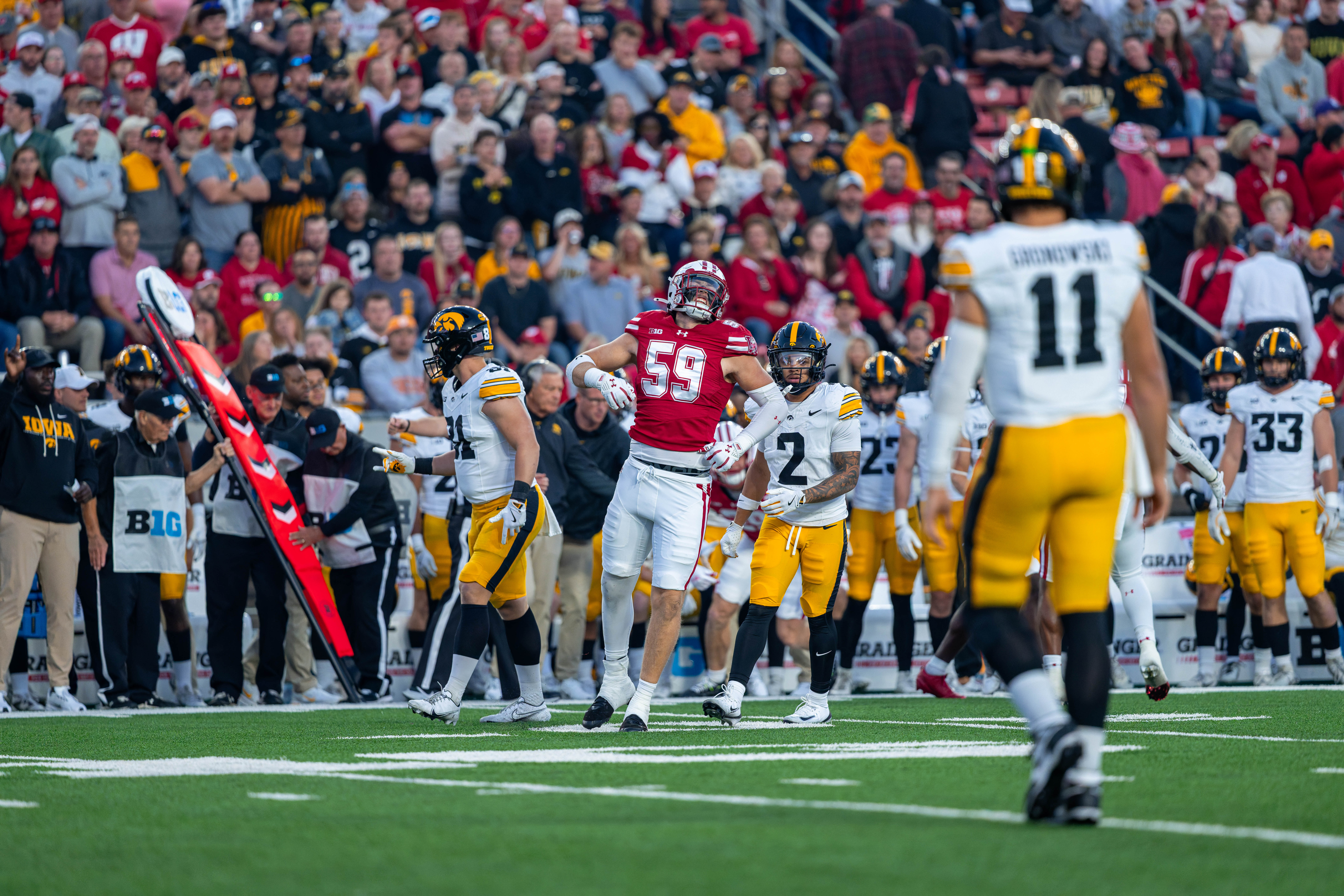 Oct 11, 2025; Madison, Wisconsin, USA; Wisconsin Badgers outside linebacker Aaron Witt (59) celebrates after a defensive stop in the first quarter against the Iowa Hawkeyes at Camp Randall Stadium. Mandatory Credit Photography by Ross Harried for Second Crop Sports.