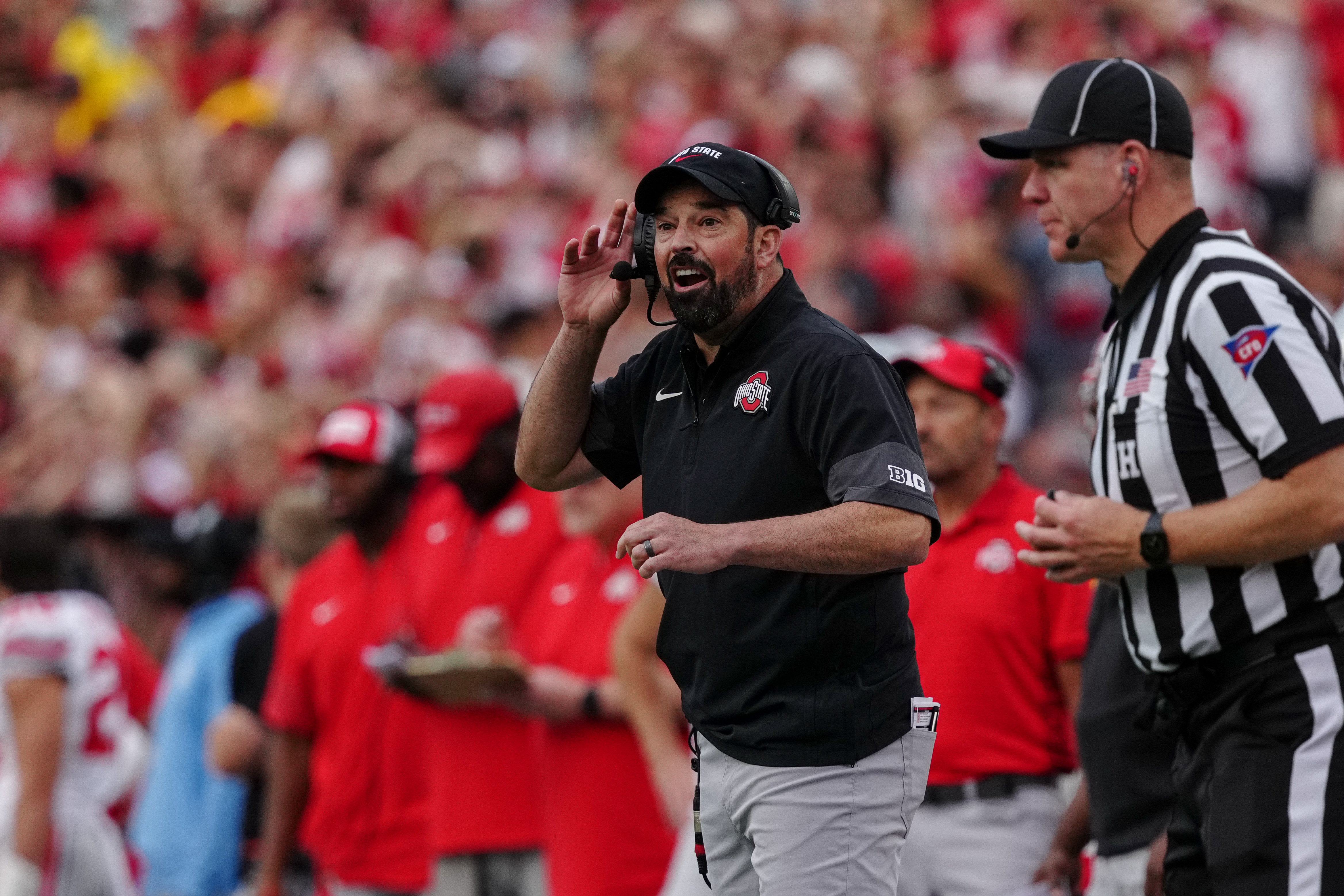 Oct 18, 2025; Madison, Wisconsin, USA; Ohio State Buckeyes head coach Ryan Day communicates from the sidelines against the Wisconsin Badgers at Camp Randall Stadium on October 18, 2025 in Madison, Wisconsin. Photography by Ross Harried for Second Crop Sports.