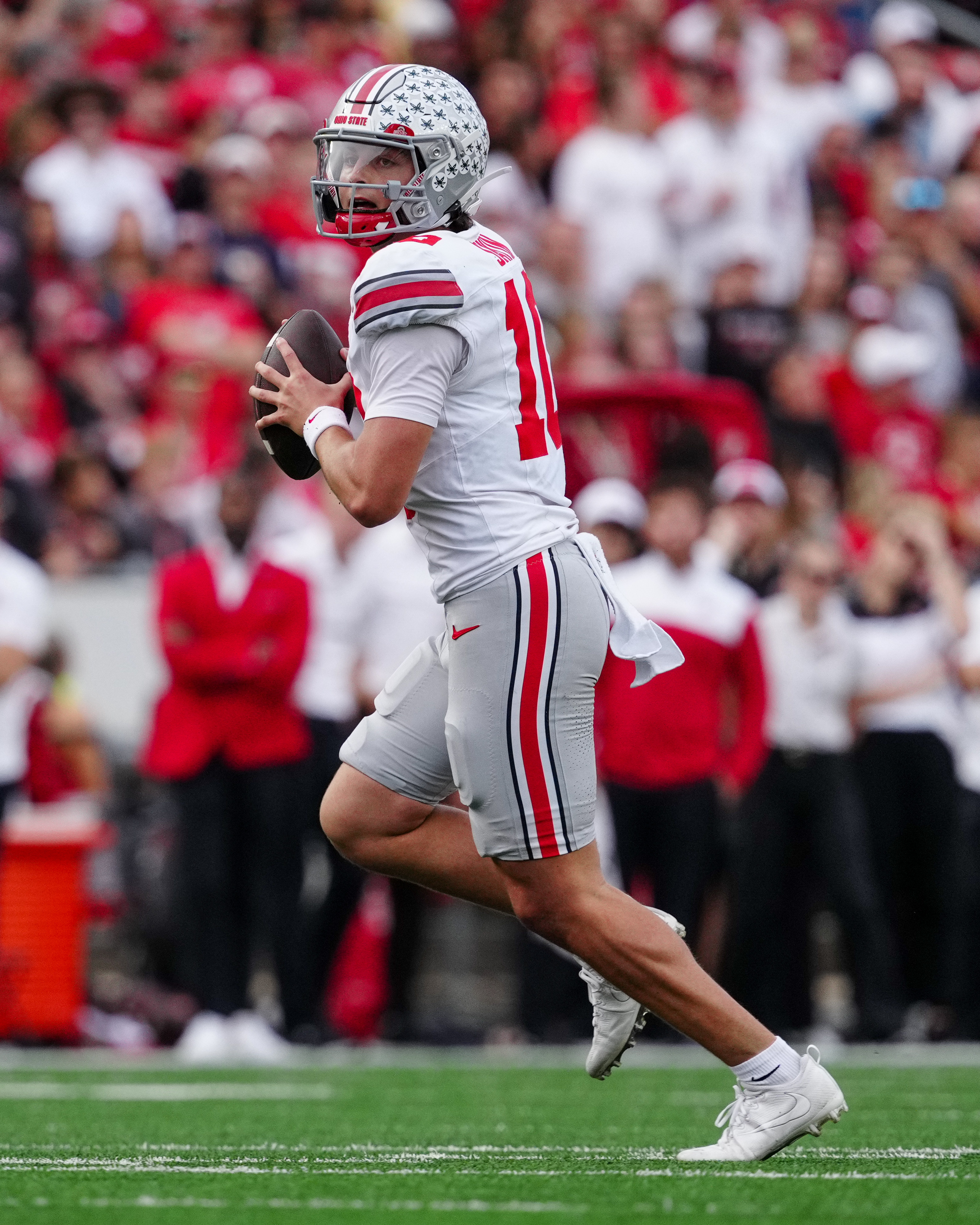 Oct 18, 2025; Madison, Wisconsin, USA; Ohio State Buckeyes quarterback Julian Sayin (10) looks to pass in the second half against the Wisconsin Badgers at Camp Randall Stadium on October 18, 2025 in Madison, Wisconsin. Photography by Ross Harried for Second Crop Sports.