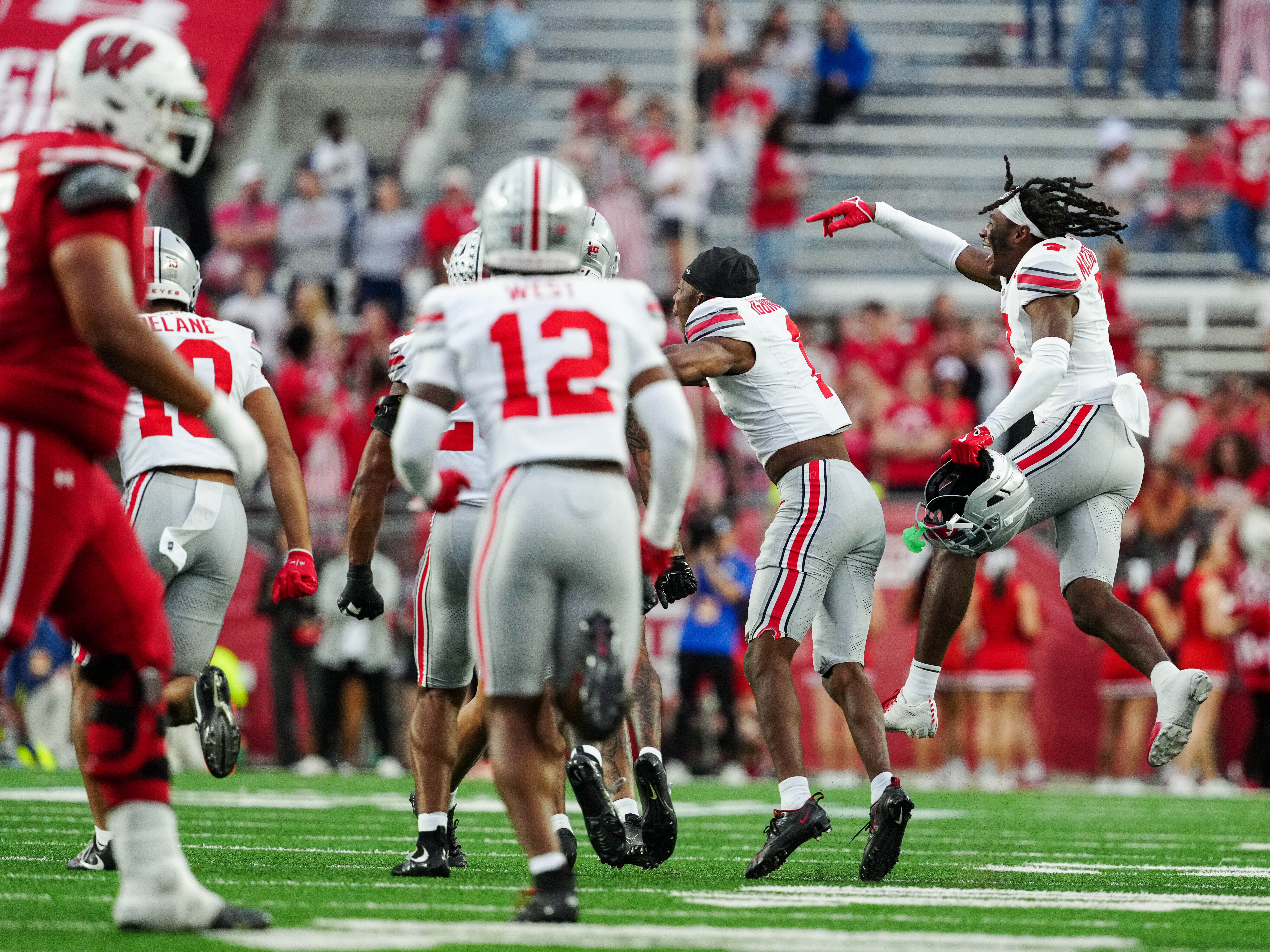 Oct 18, 2025; Madison, Wisconsin, USA; The Ohio State Buckeyes celebrate a shut out win against the Wisconsin Badgers at Camp Randall Stadium on October 18, 2025 in Madison, Wisconsin. Photography by Ross Harried for Second Crop Sports.